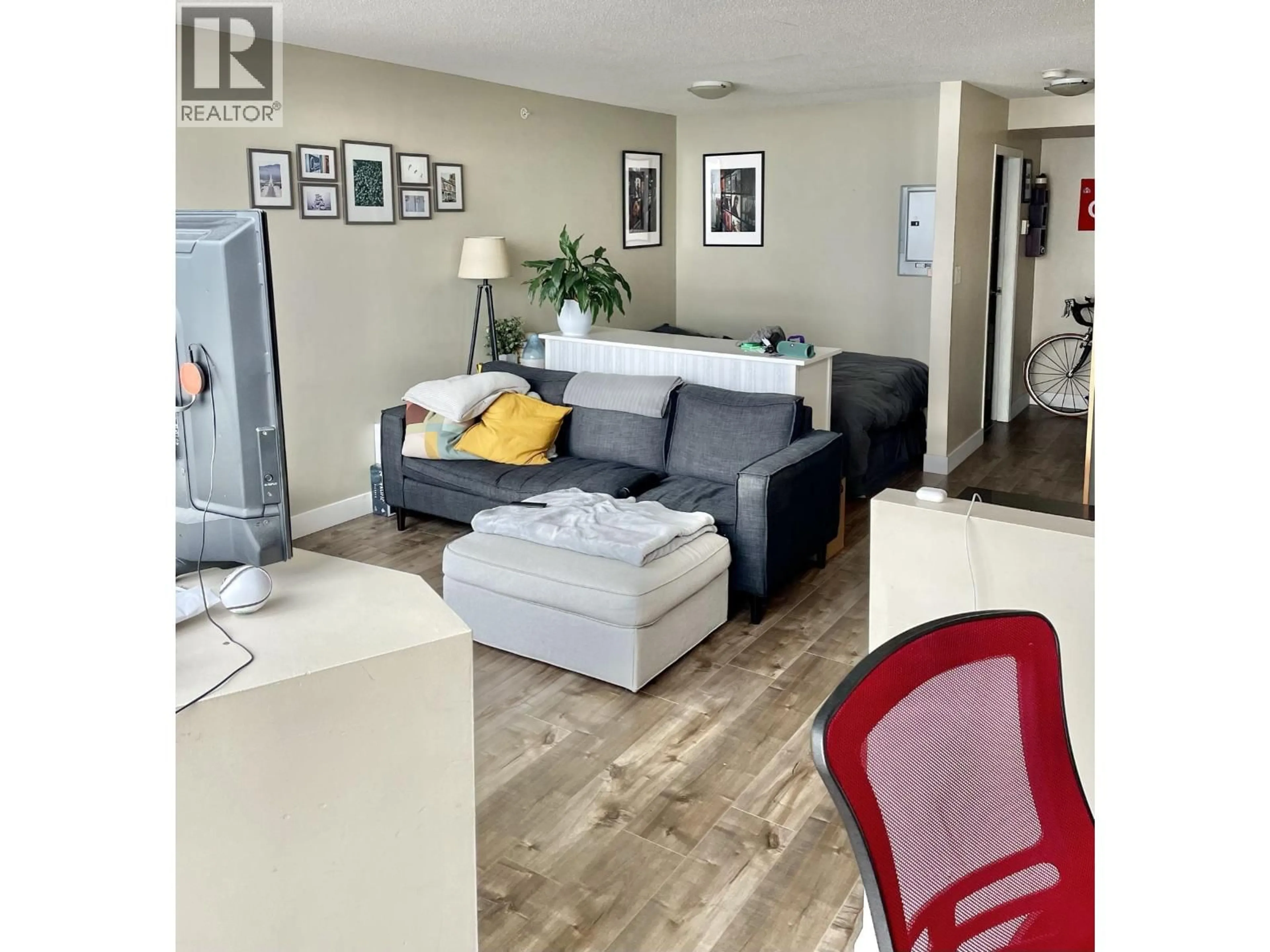 Living room with furniture, wood/laminate floor for 2705 - 501 PACIFIC STREET, Vancouver British Columbia V6Z2X6