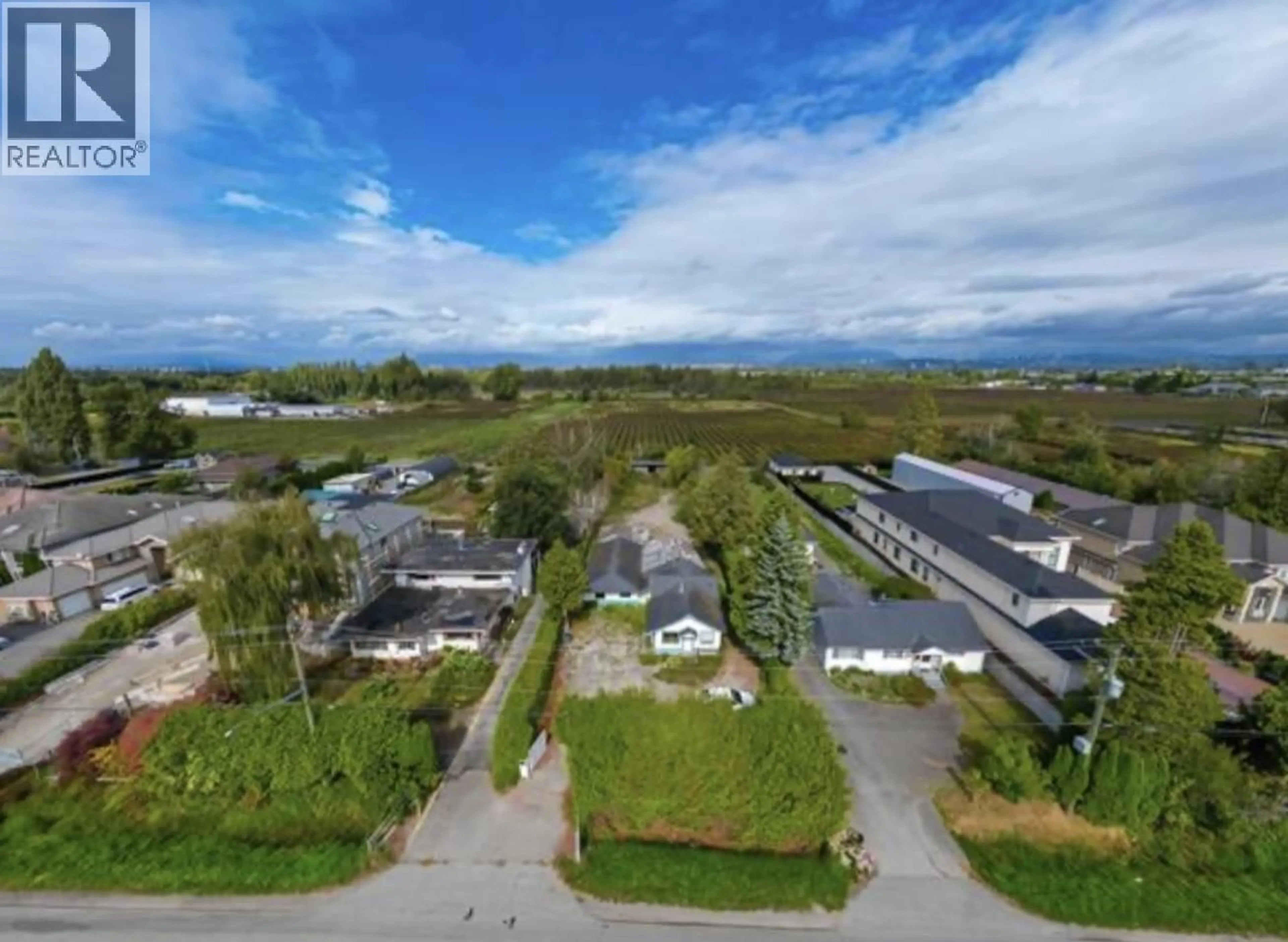 A pic from outside/outdoor area/front of a property/back of a property/a pic from drone, mountain view for 13331 BLUNDELL ROAD, Richmond British Columbia V6W1B6