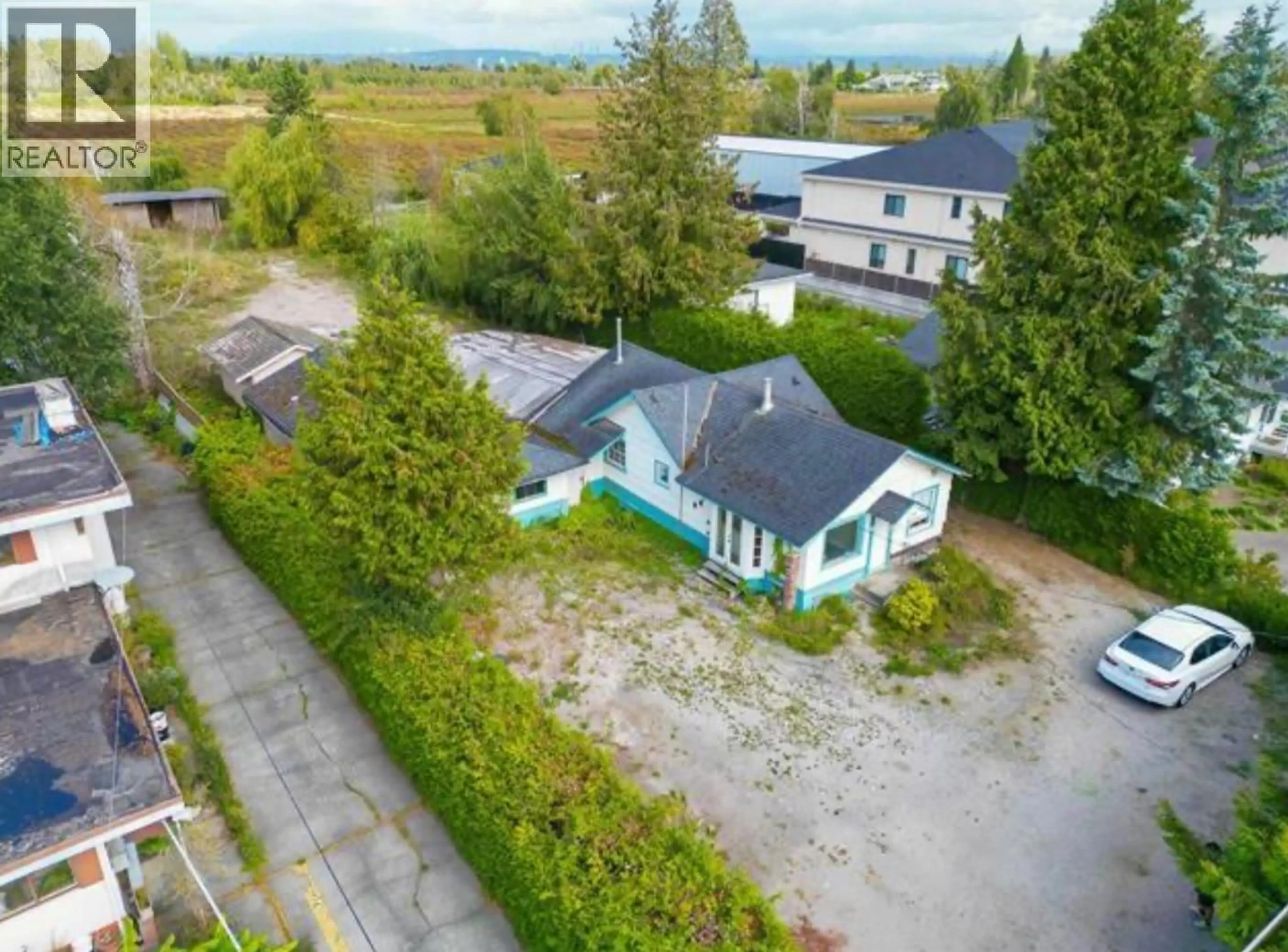 A pic from outside/outdoor area/front of a property/back of a property/a pic from drone, street for 13331 BLUNDELL ROAD, Richmond British Columbia V6W1B6