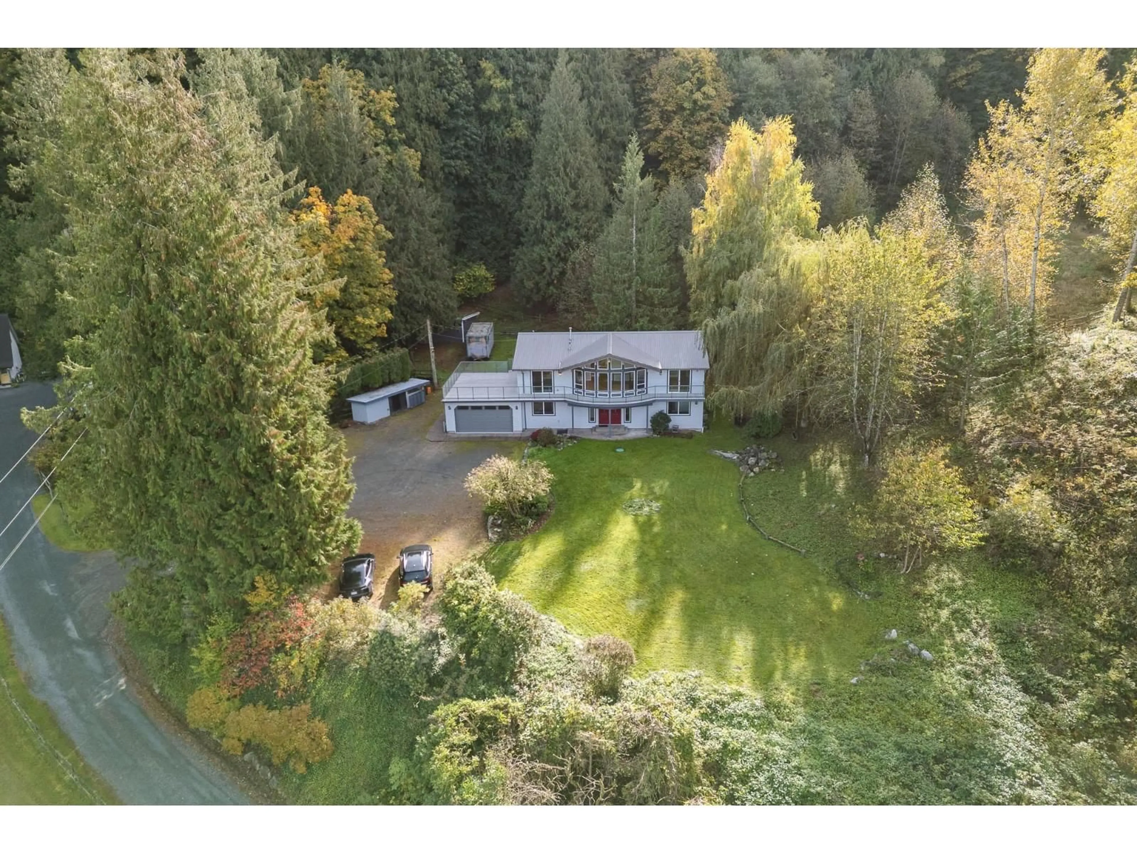 A pic from outside/outdoor area/front of a property/back of a property/a pic from drone, forest/trees view for 41612 MAJUBA HILL ROAD, Yarrow British Columbia V2R5G8
