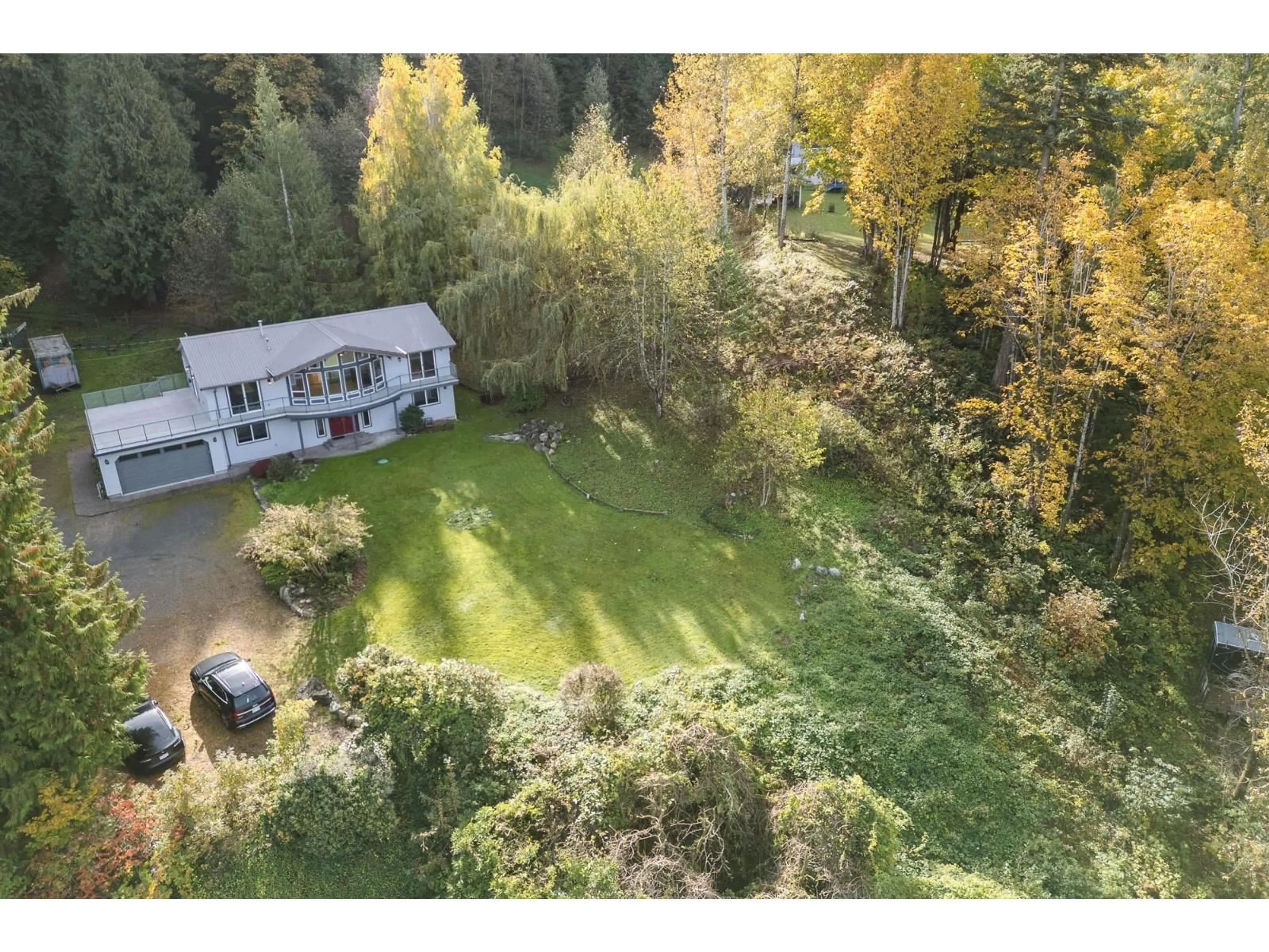 A pic from outside/outdoor area/front of a property/back of a property/a pic from drone, forest/trees view for 41612 MAJUBA HILL ROAD, Yarrow British Columbia V2R5G8