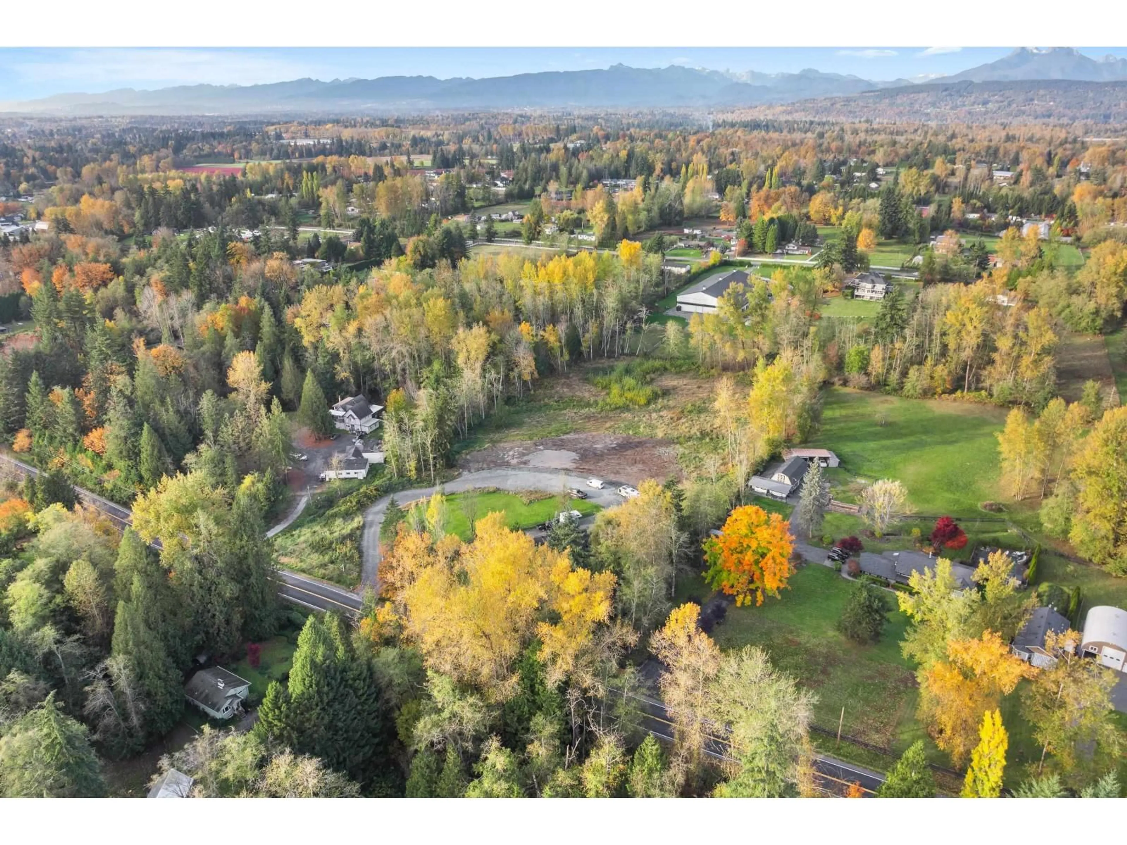 A pic from outside/outdoor area/front of a property/back of a property/a pic from drone, mountain view for 25887 60, Langley British Columbia V4W1L3