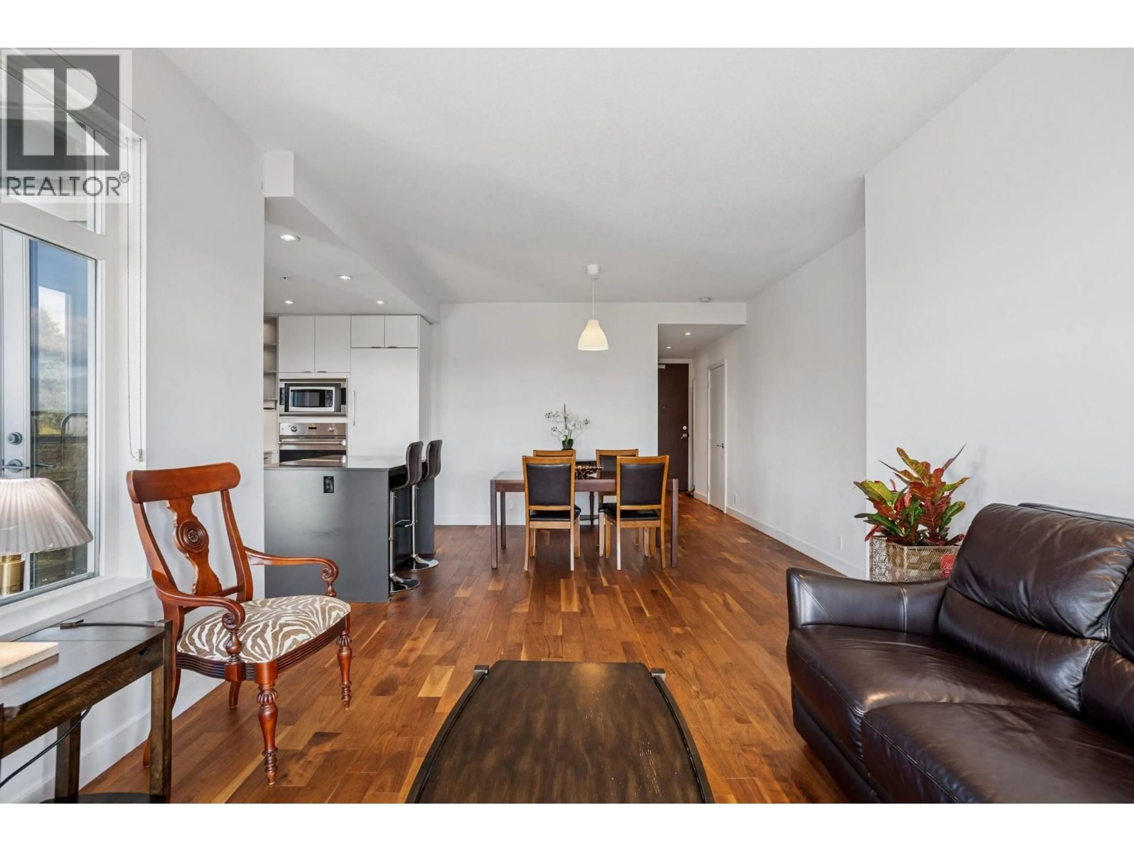 Living room with furniture, wood/laminate floor for 508 - 4867 CAMBIE STREET, Vancouver British Columbia V5Z0C5