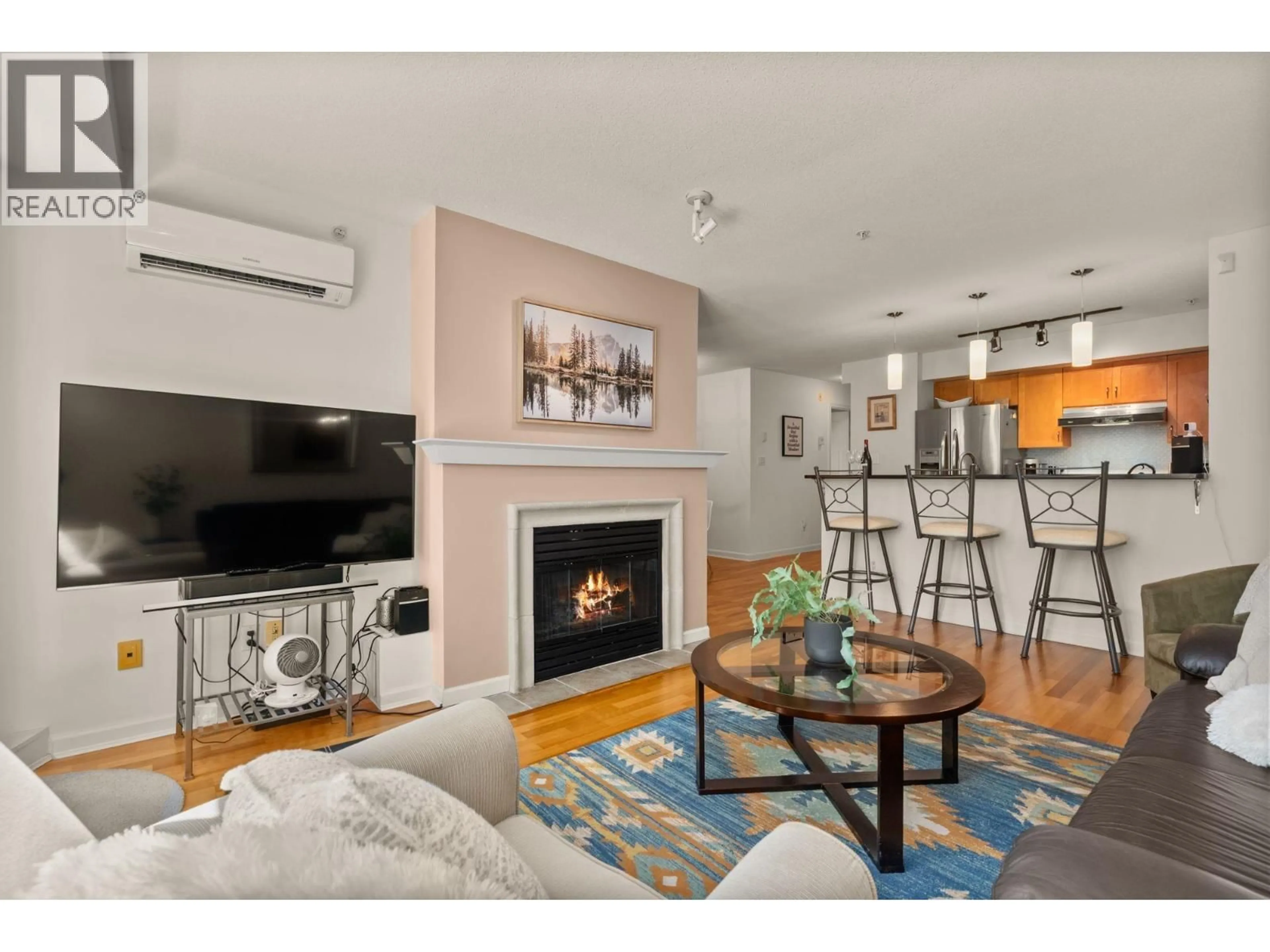 Living room with furniture, wood/laminate floor for 308 - 2161 12TH AVENUE, Vancouver British Columbia V6K4S7