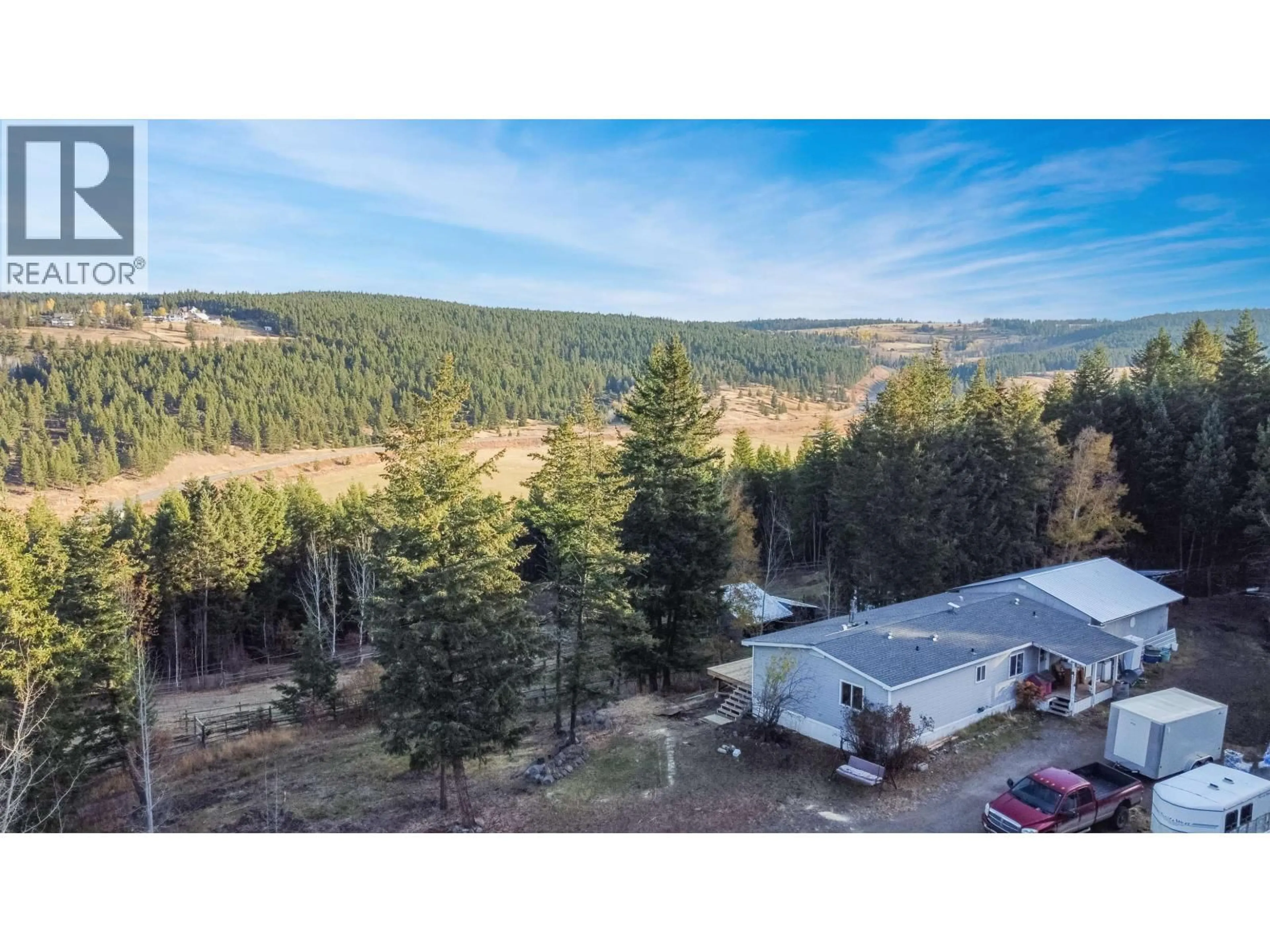 A pic from outside/outdoor area/front of a property/back of a property/a pic from drone, forest/trees view for 1558 VALLEYVIEW DRIVE, Williams Lake British Columbia V2G4W3