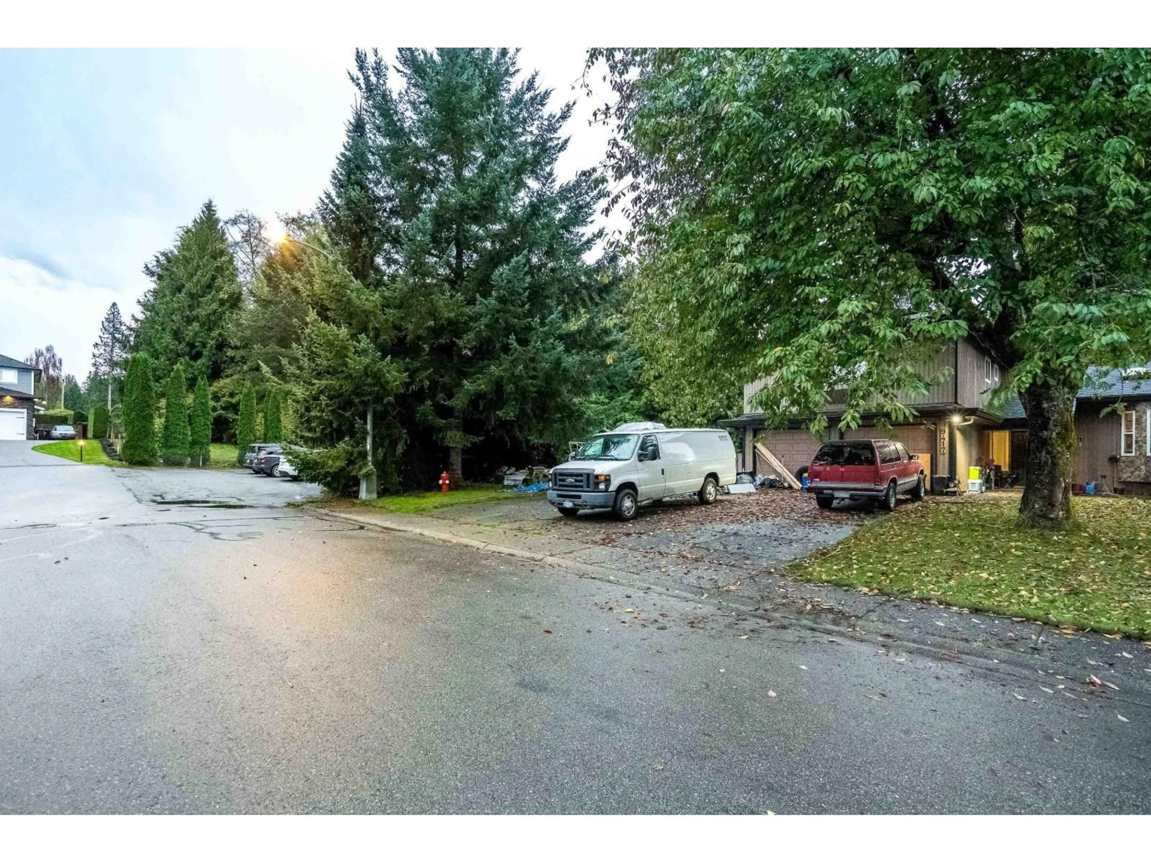 A pic from outside/outdoor area/front of a property/back of a property/a pic from drone, street for 9417 204A, Langley British Columbia V1M1Y9
