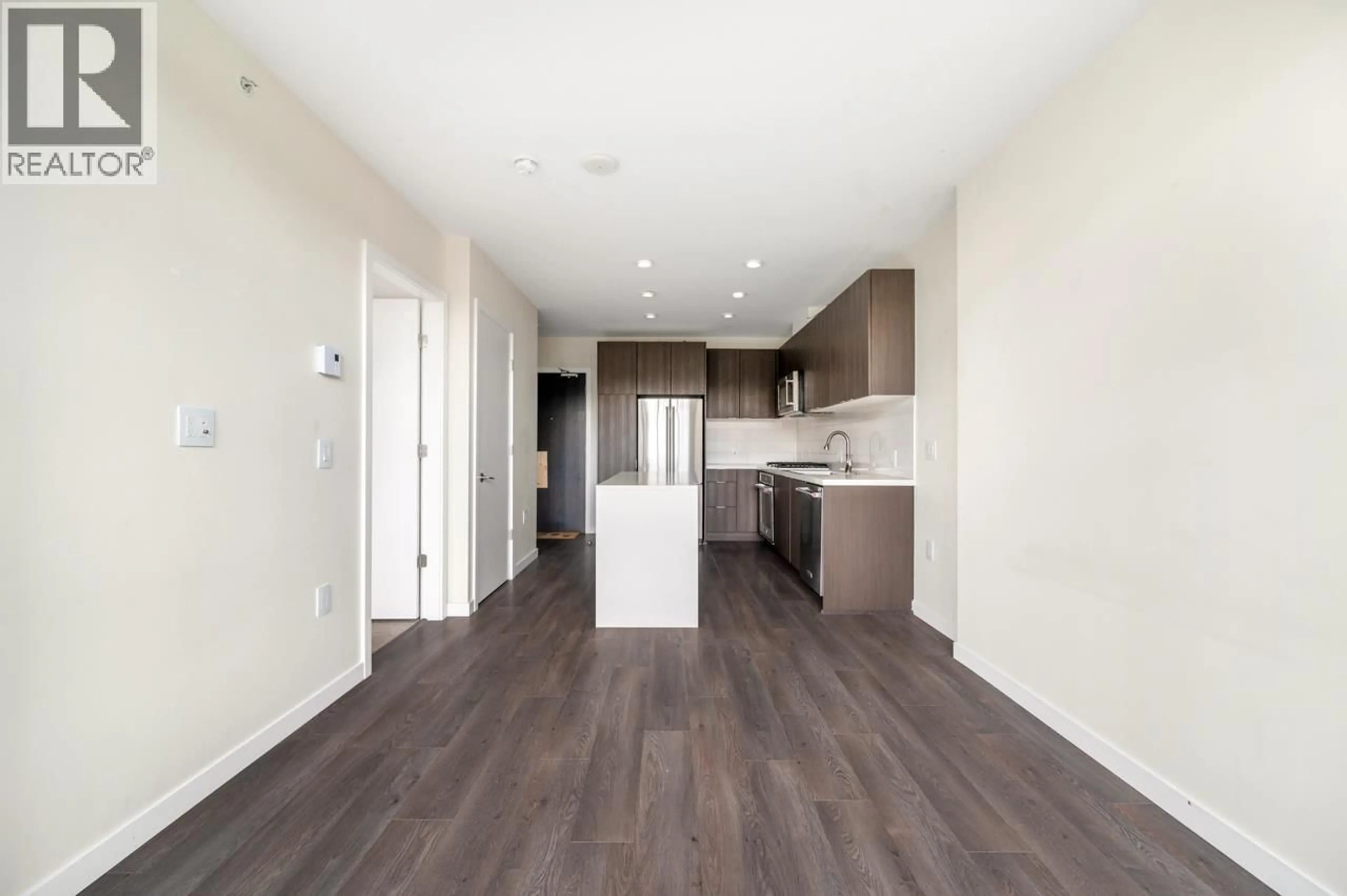 Open concept kitchen, wood/laminate floor for 705 - 530 WHITING WAY, Coquitlam British Columbia V3J0J4