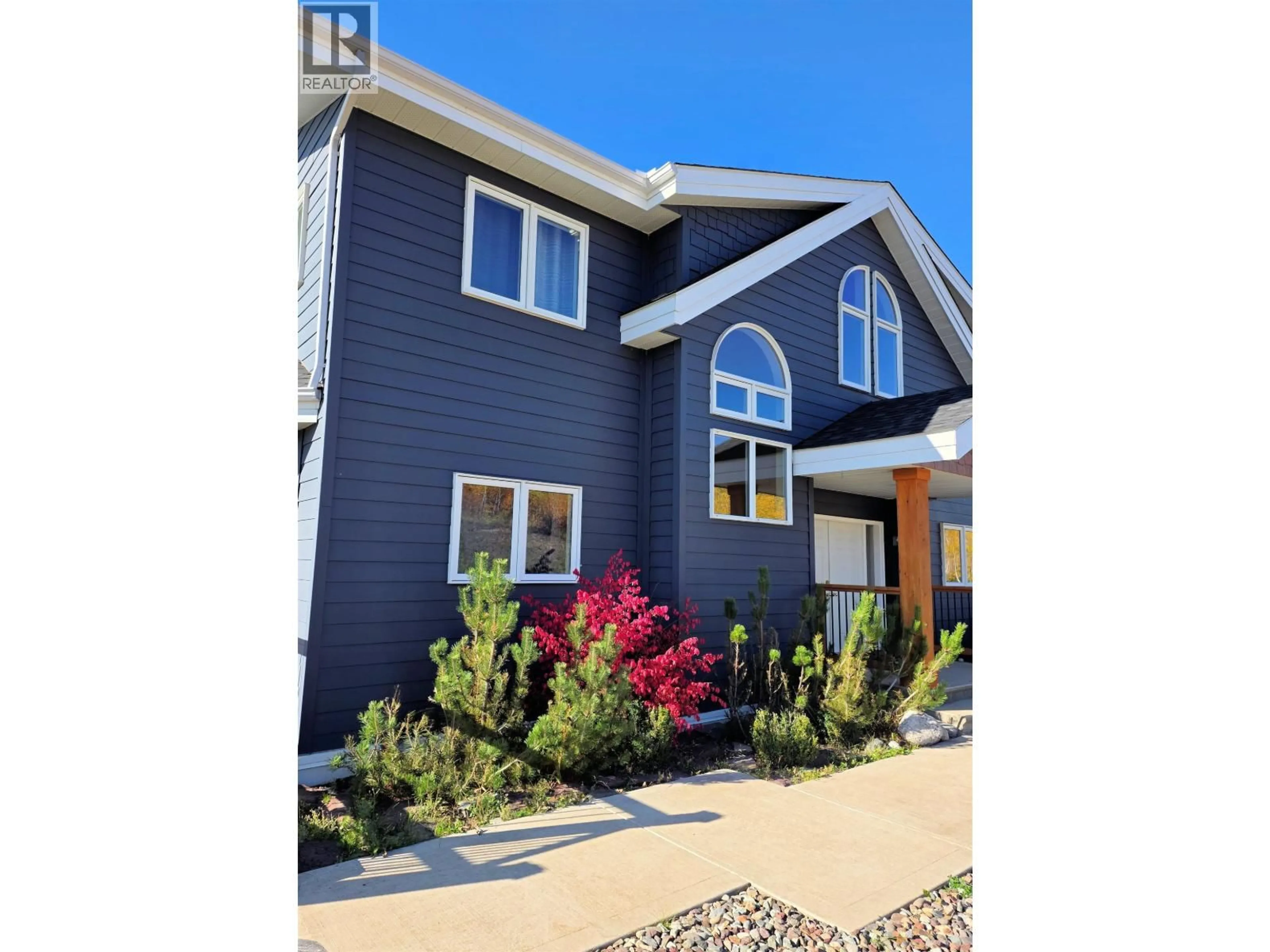 Home with vinyl exterior material, street for 8020 HISLOP ROAD, Telkwa British Columbia V0J2X1