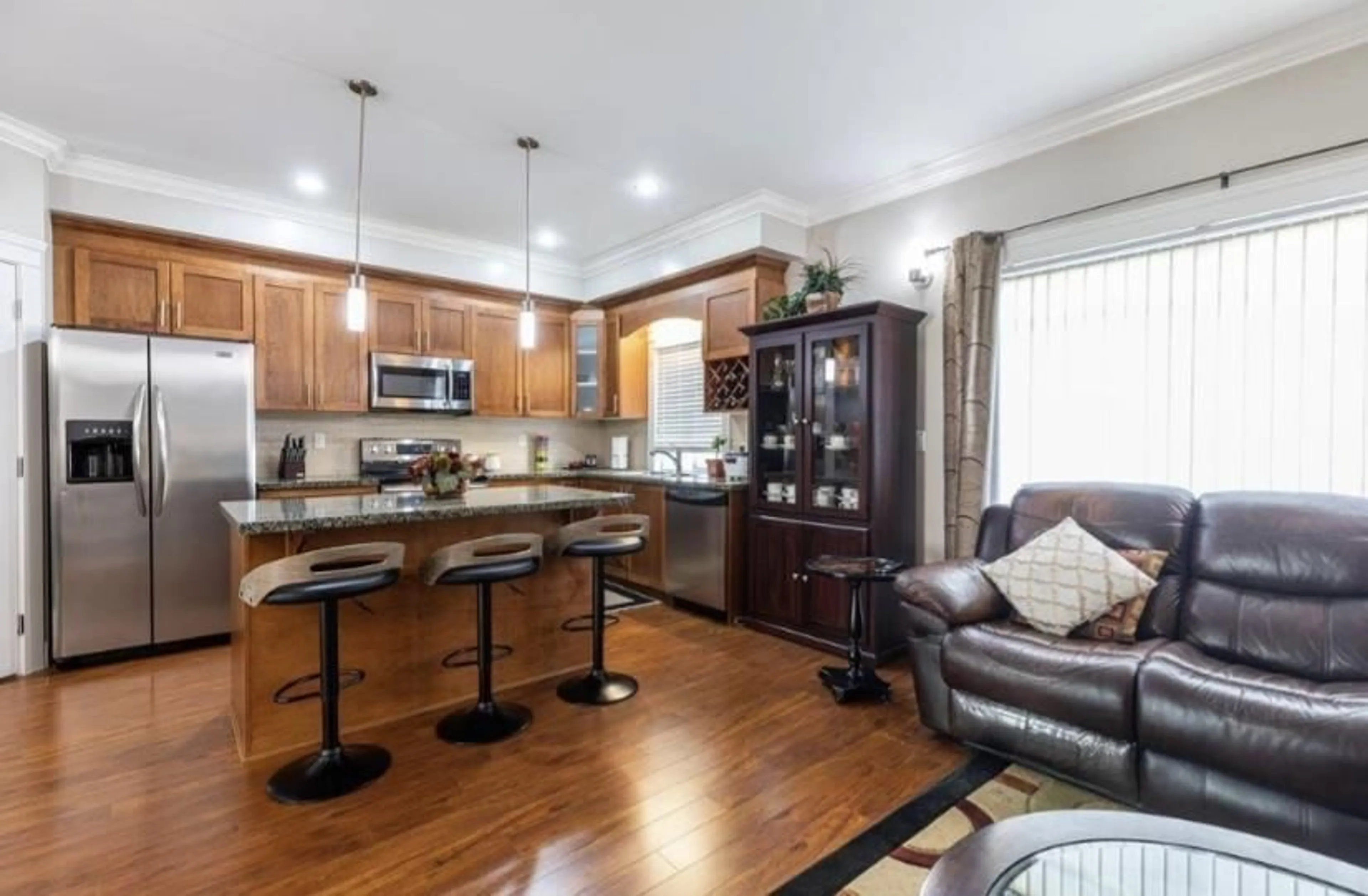 Open concept kitchen, wood/laminate floor for 21 - 8358 121A, Surrey British Columbia V3W1T6