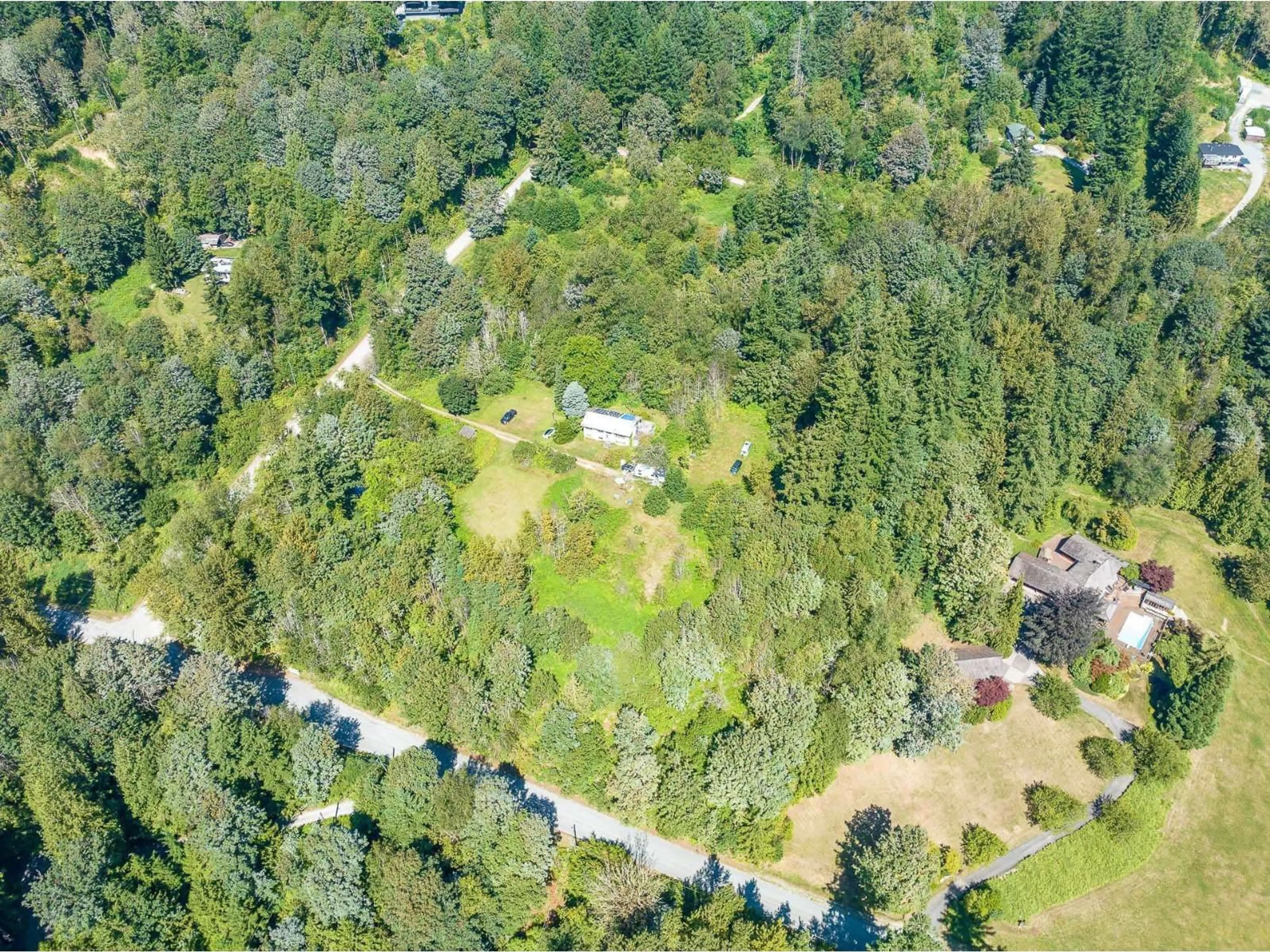 A pic from outside/outdoor area/front of a property/back of a property/a pic from drone, forest/trees view for 8850 FOULDS, Mission British Columbia V4S1E8