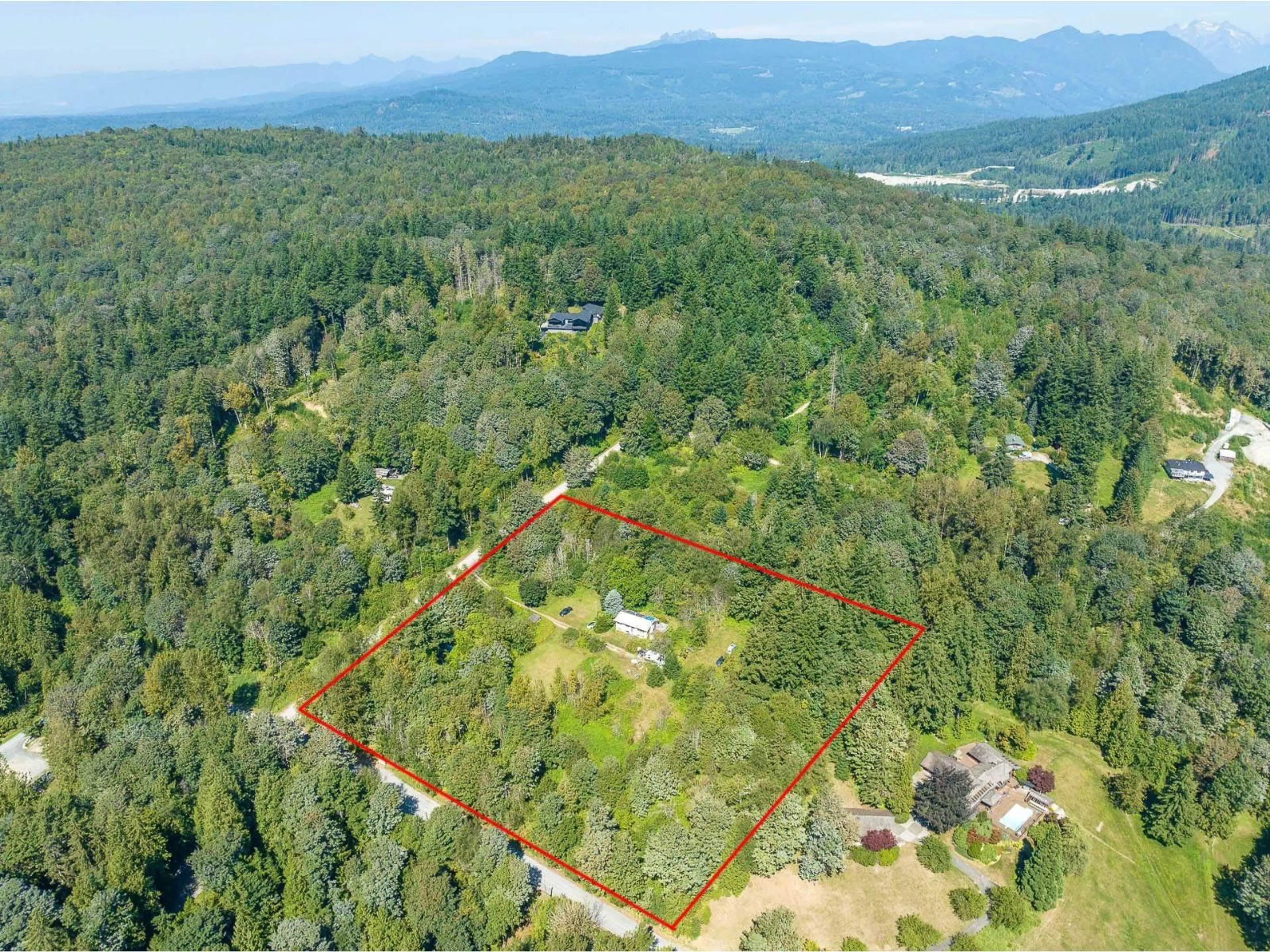 A pic from outside/outdoor area/front of a property/back of a property/a pic from drone, forest/trees view for 8850 FOULDS, Mission British Columbia V4S1E8