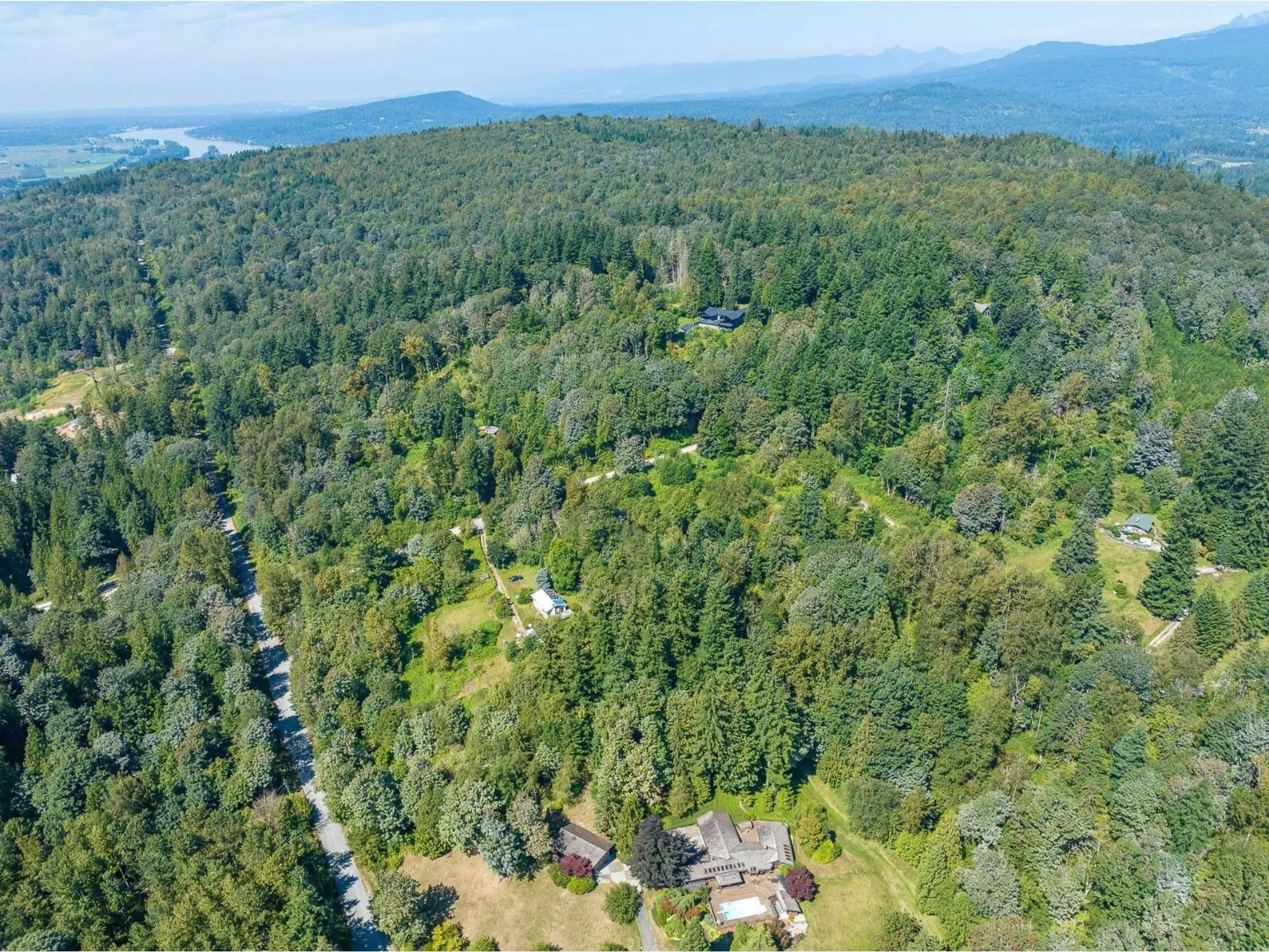 A pic from outside/outdoor area/front of a property/back of a property/a pic from drone, forest/trees view for 8850 FOULDS, Mission British Columbia V4S1E8