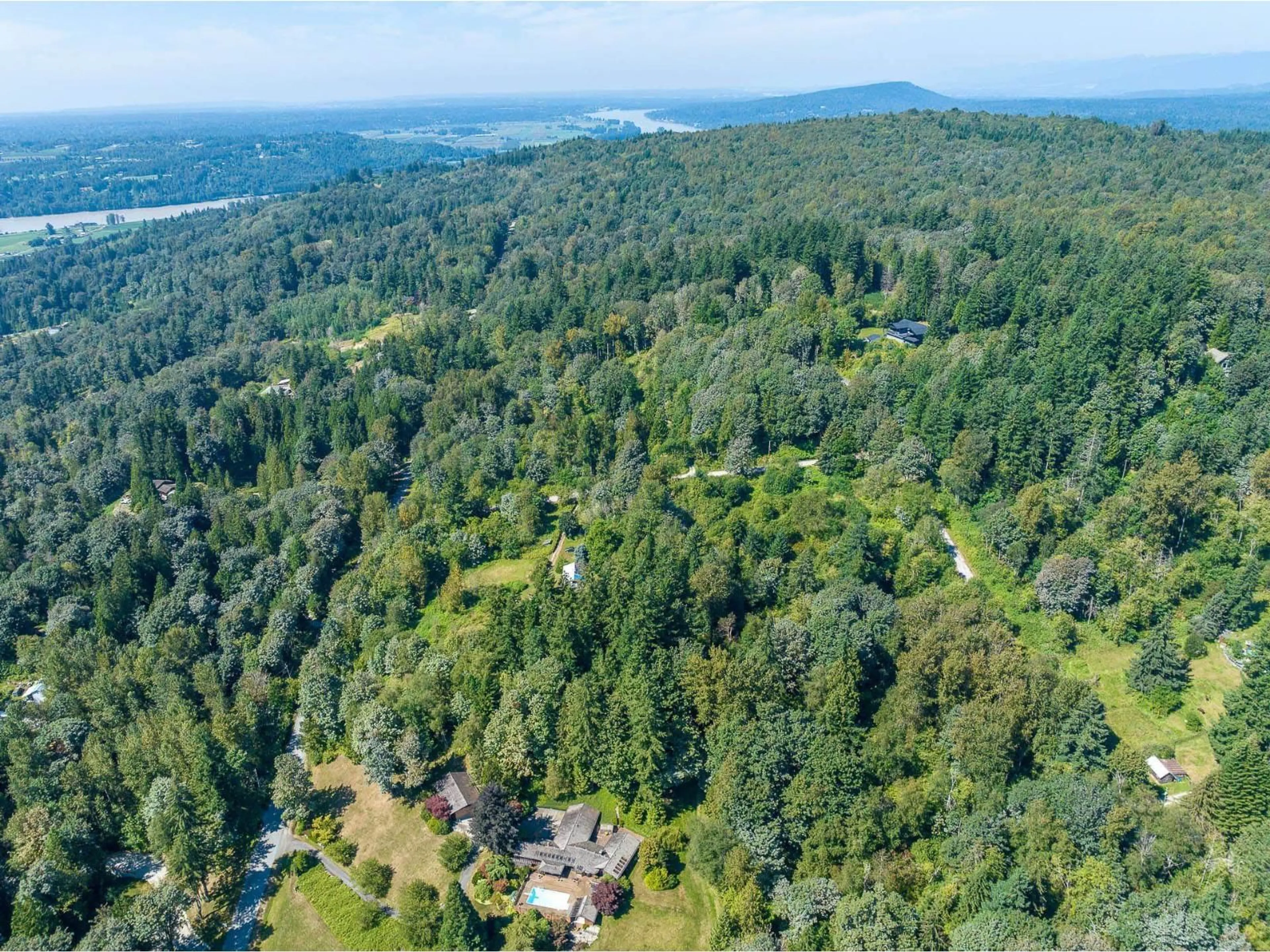 A pic from outside/outdoor area/front of a property/back of a property/a pic from drone, forest/trees view for 8850 FOULDS, Mission British Columbia V4S1E8