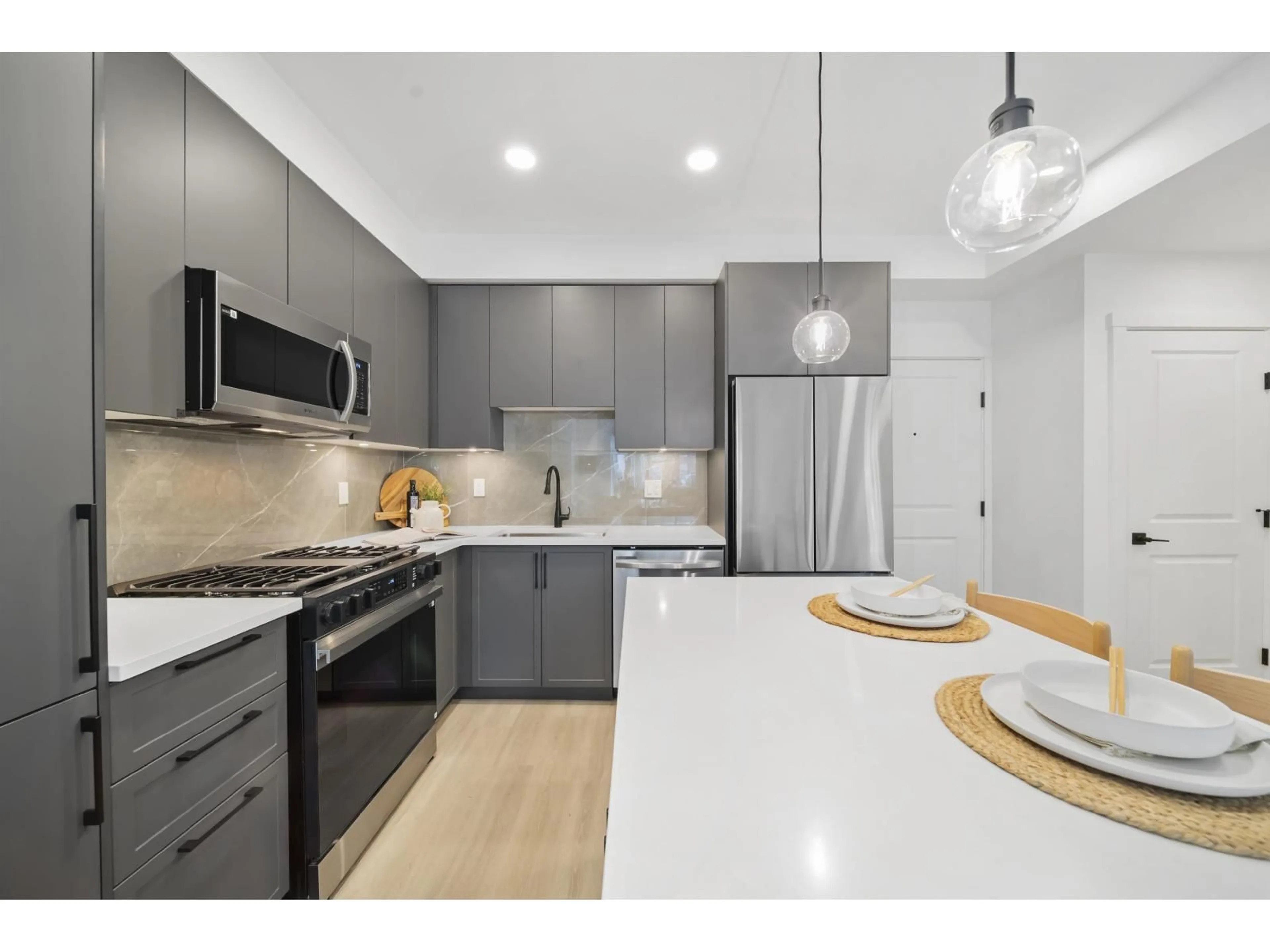 Open concept kitchen, unknown for 112 - 3438 146A, Surrey British Columbia V0V0V0