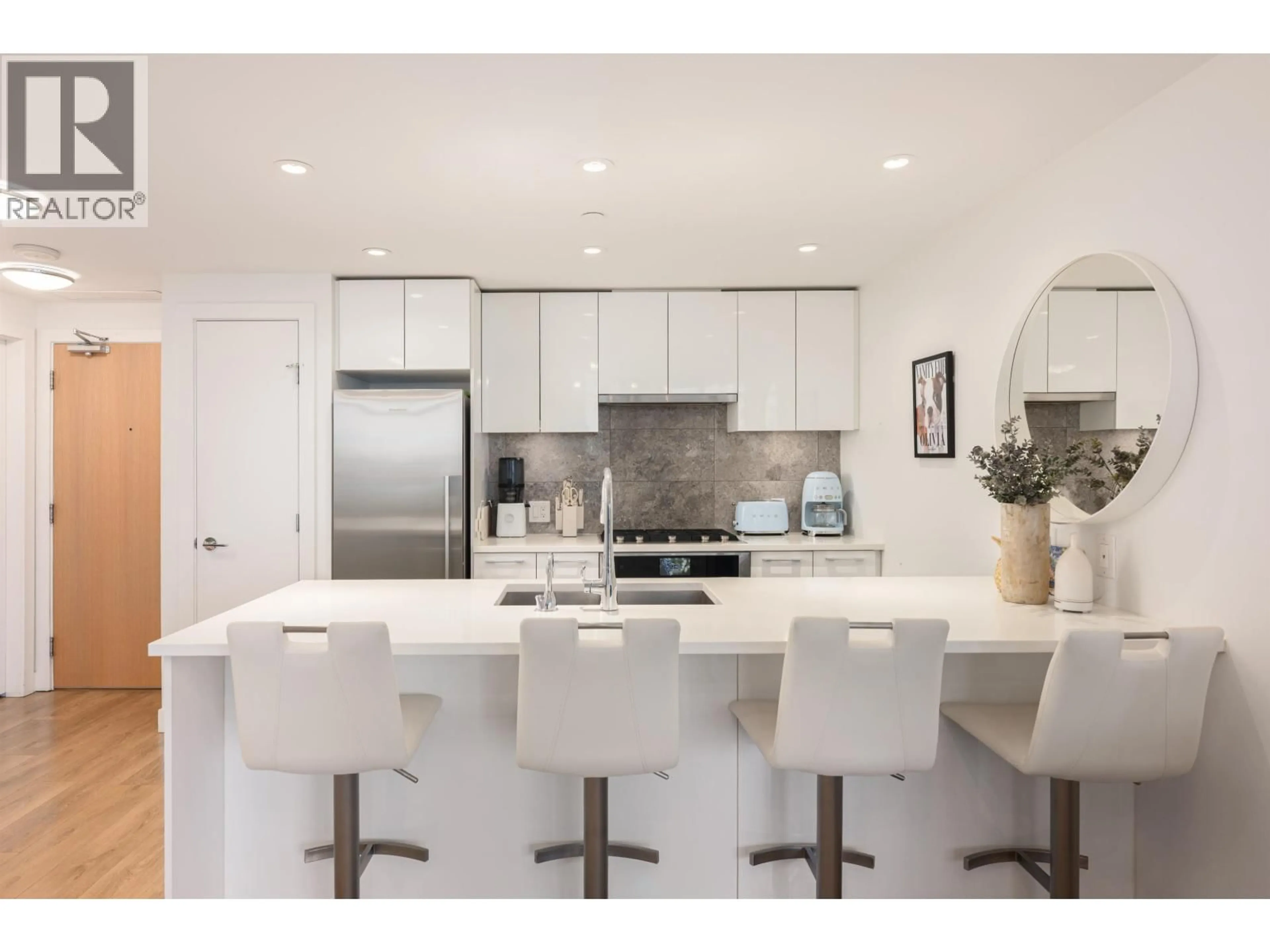 Open concept kitchen, ceramic/tile floor for 906 - 3557 SAWMILL CRESCENT, Vancouver British Columbia V5S0E2