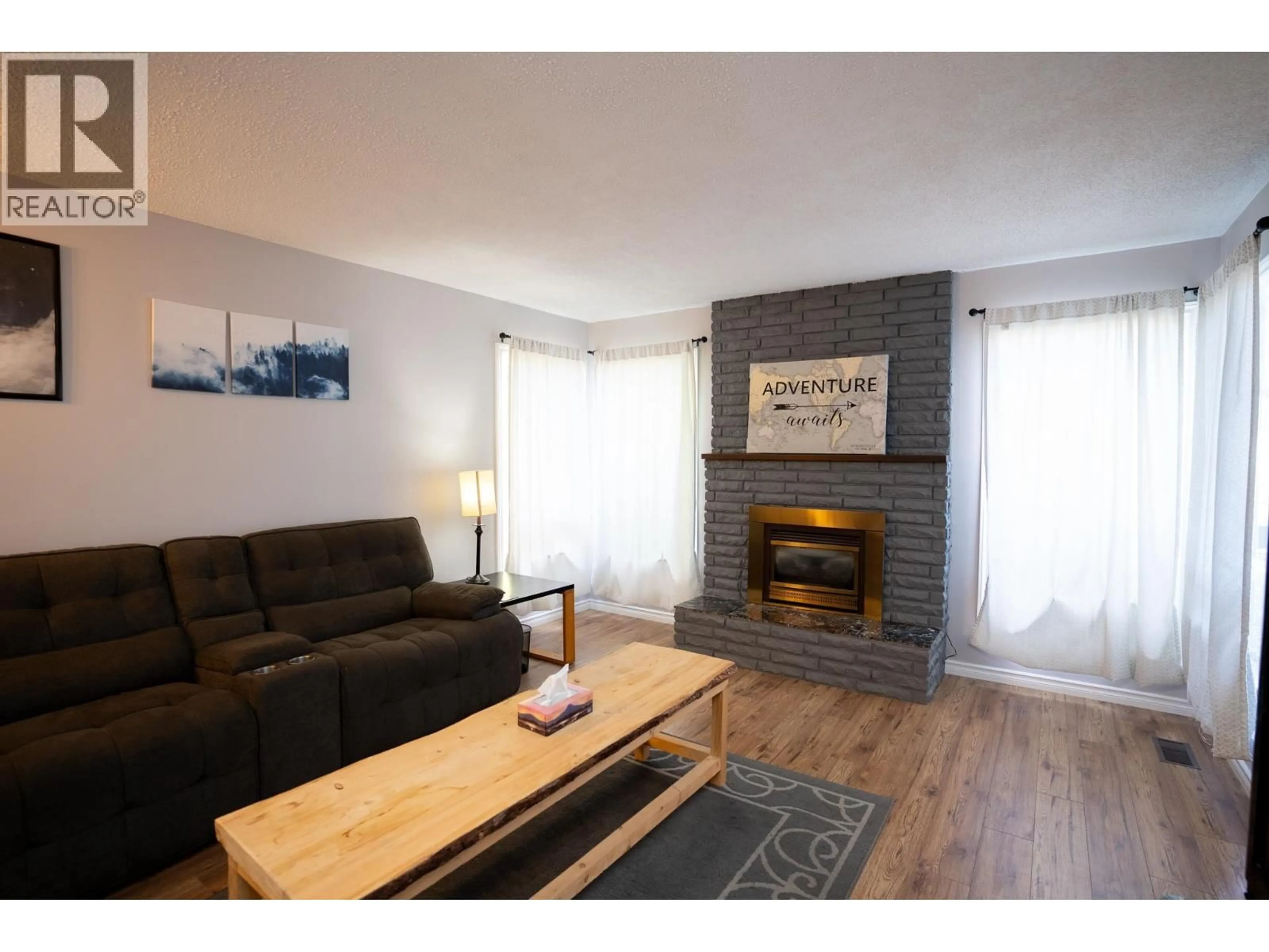 Living room with furniture, wood/laminate floor for 7935 ROCHESTER CRESCENT, Prince George British Columbia V2N3V7