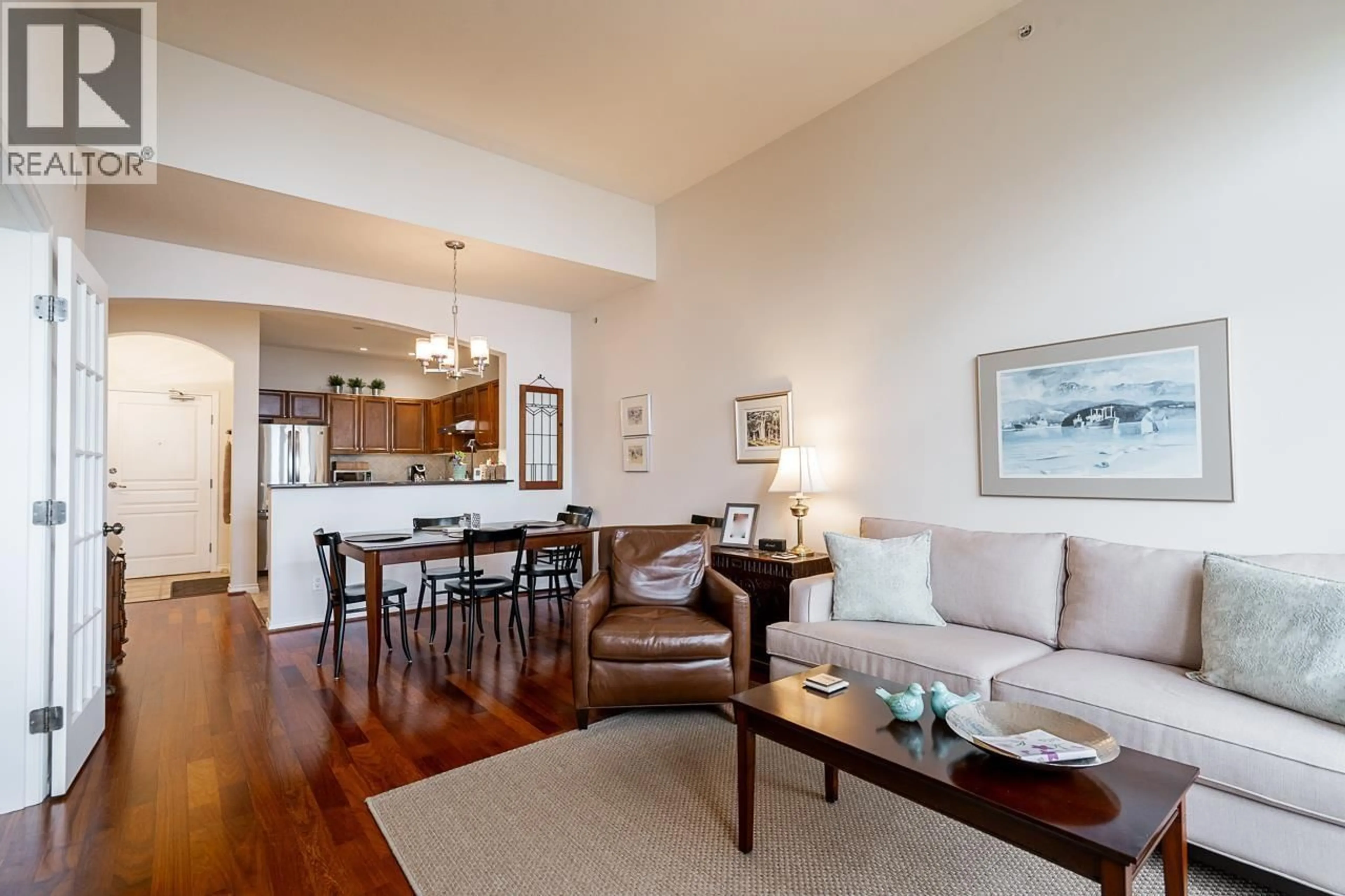 Living room with furniture, wood/laminate floor for 402 - 2175 SALAL DRIVE, Vancouver British Columbia V6K4V2