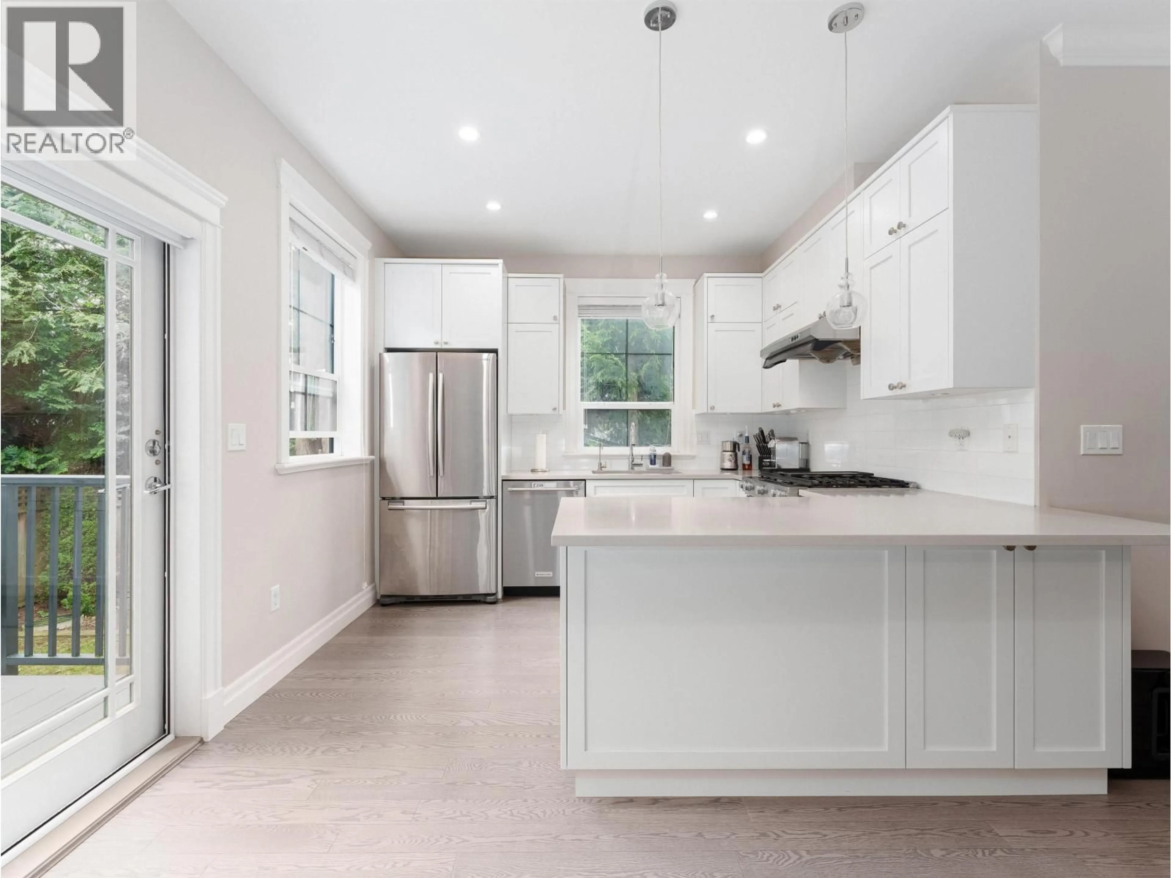 Open concept kitchen, ceramic/tile floor for 3 - 8600 NO. 2 ROAD, Richmond British Columbia V7C3M5