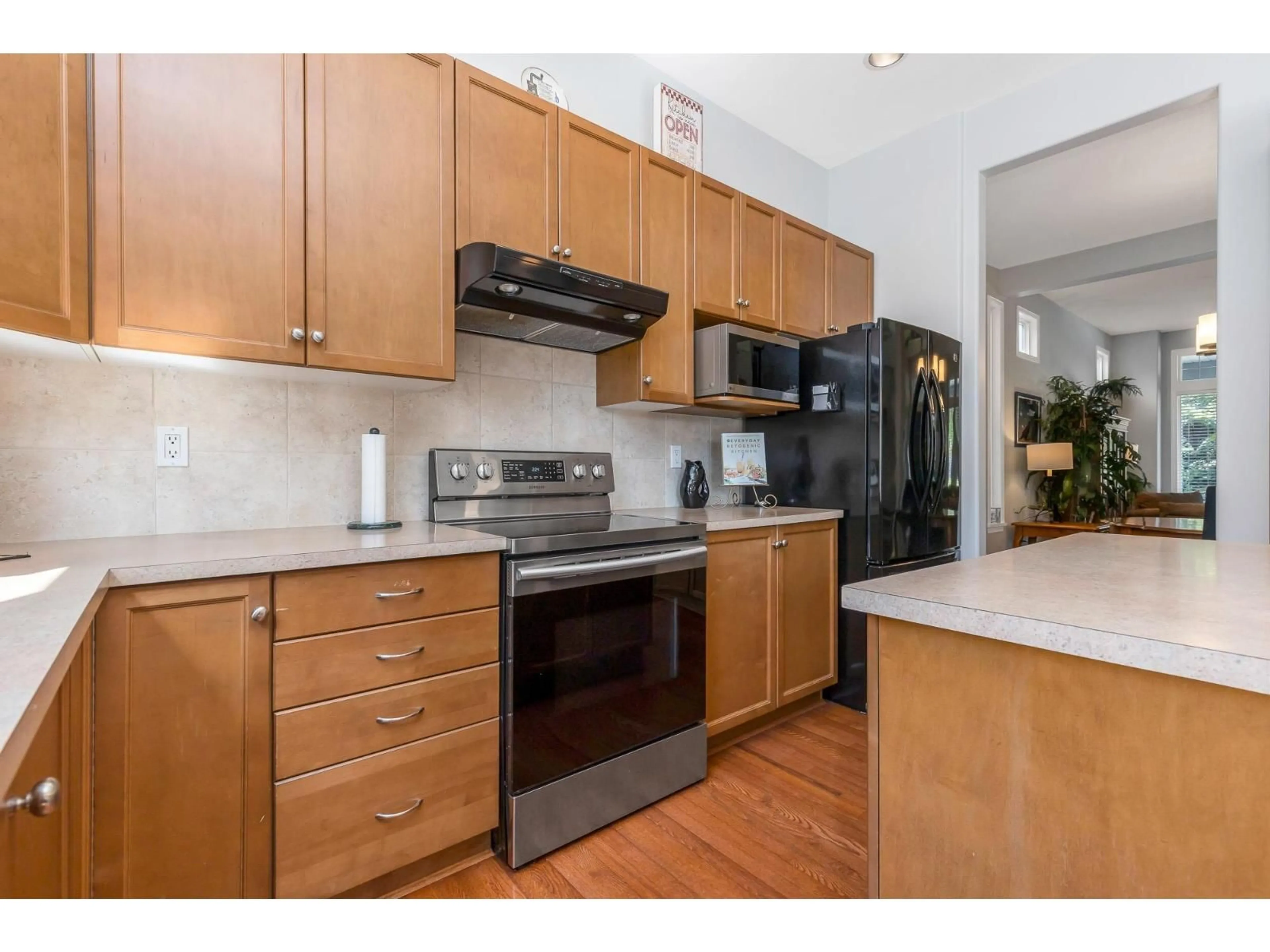 Standard kitchen, wood/laminate floor for 7037 201, Langley British Columbia V2Y2Z3