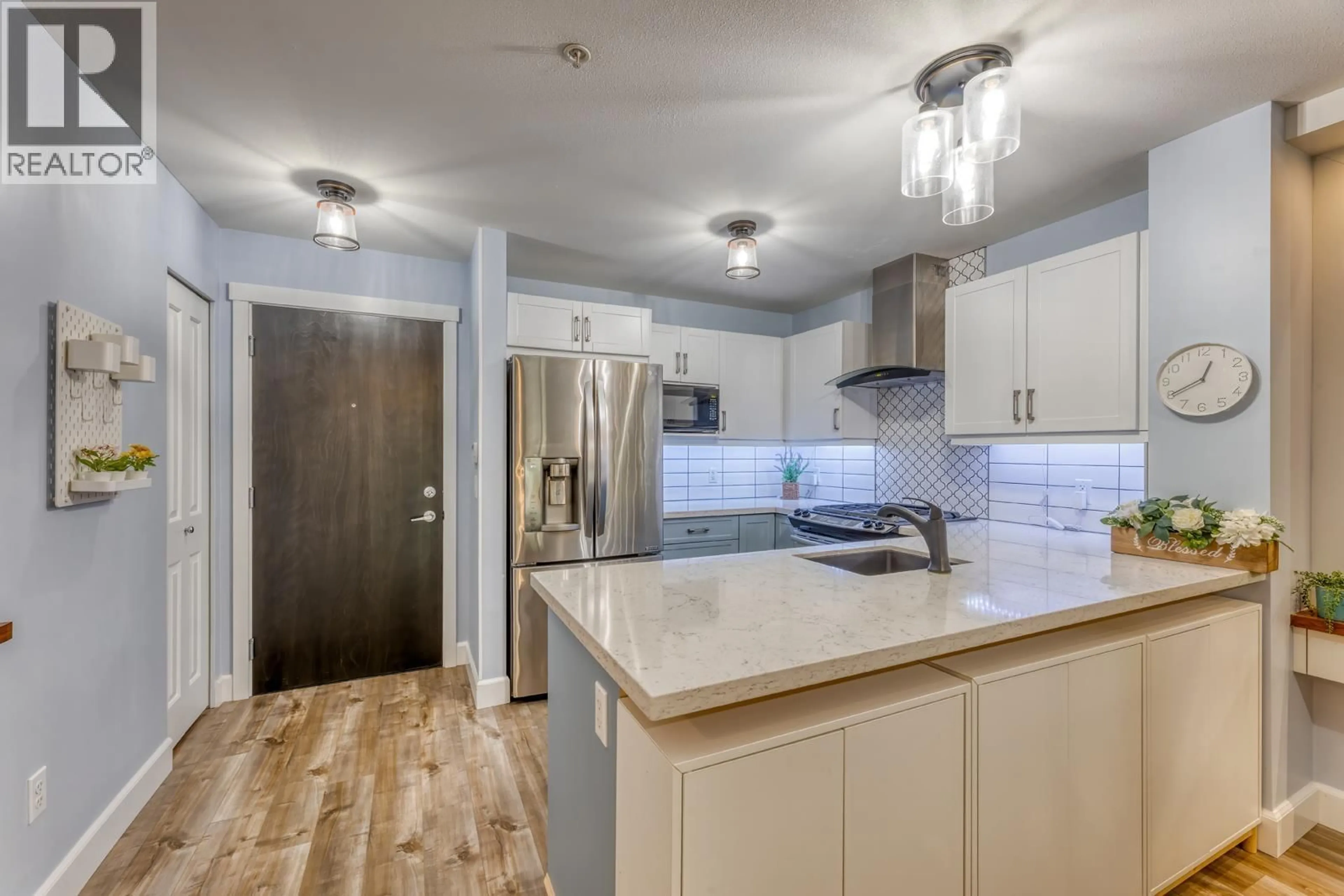 Open concept kitchen, unknown for 202 - 3156 DAYANEE SPRINGS BOULEVARD, Coquitlam British Columbia V3E0B7