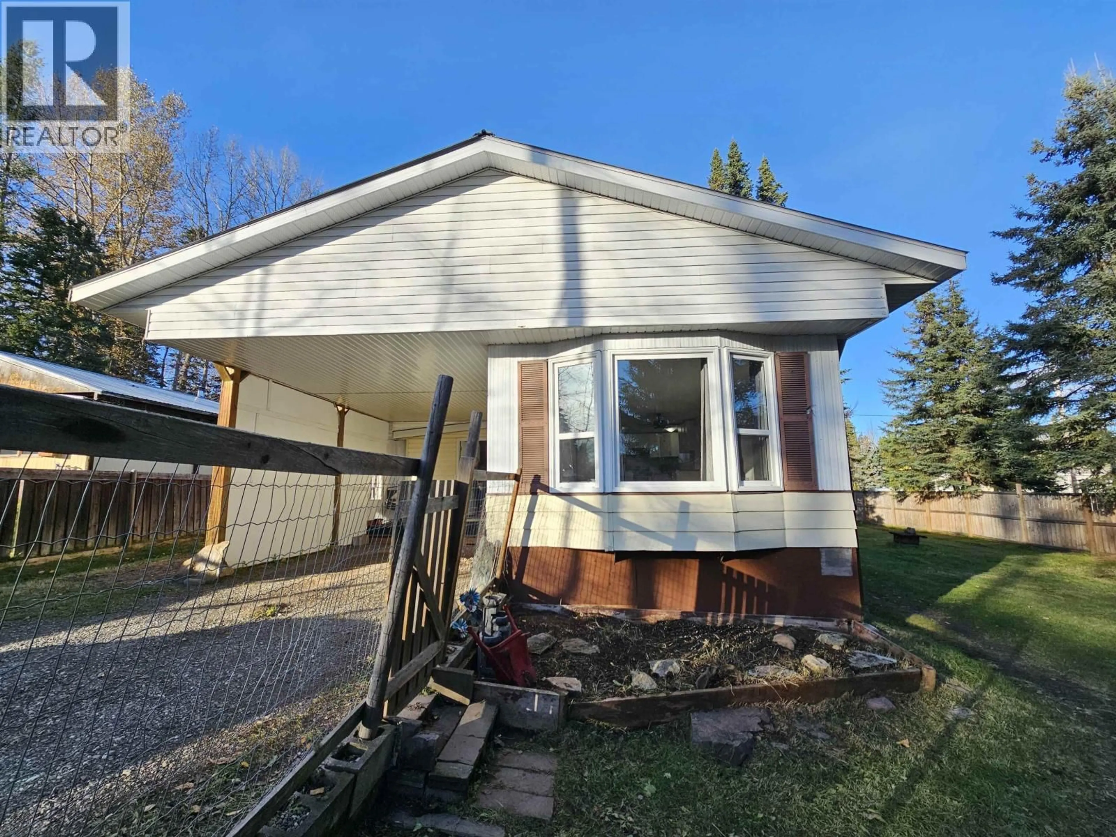 Home with vinyl exterior material, street for 4004 JADE DRIVE, Prince George British Columbia V2K3M2