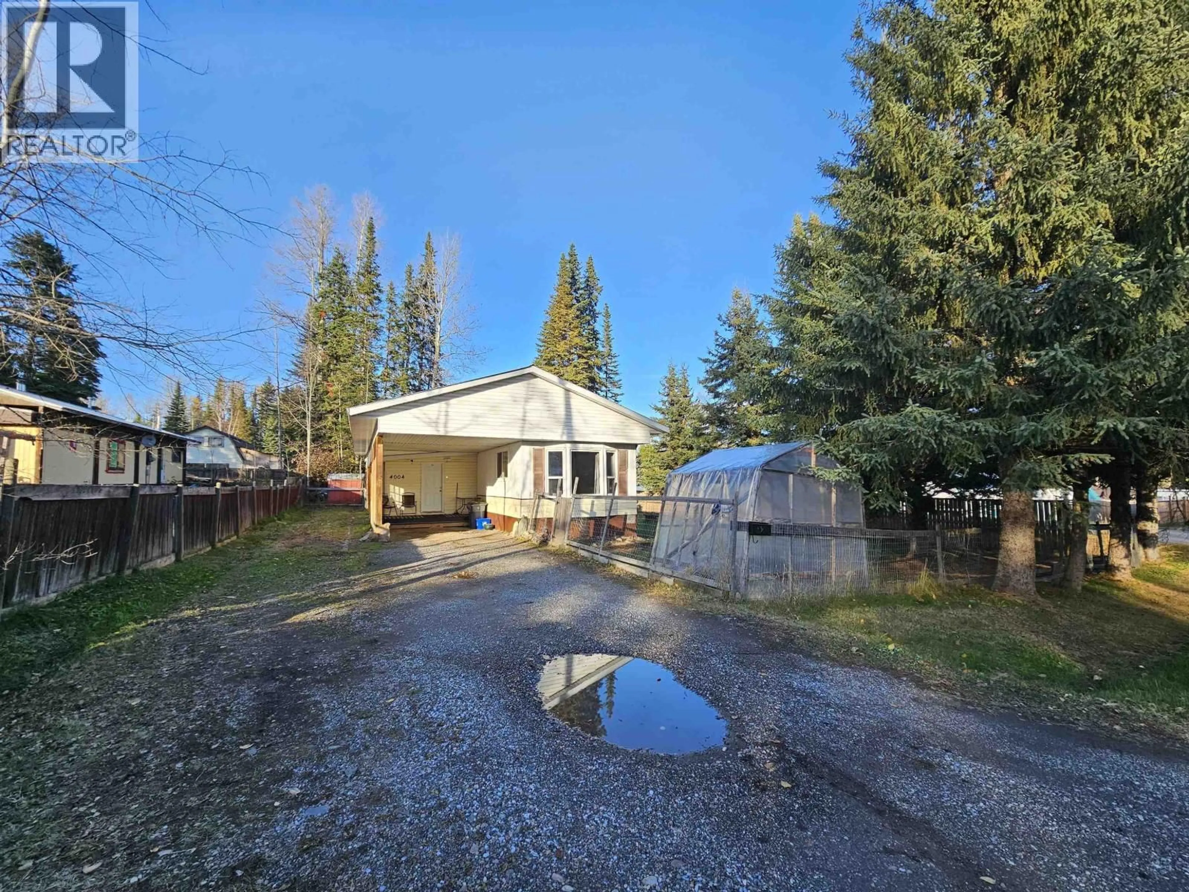 A pic from outside/outdoor area/front of a property/back of a property/a pic from drone, water/lake/river/ocean view for 4004 JADE DRIVE, Prince George British Columbia V2K3M2