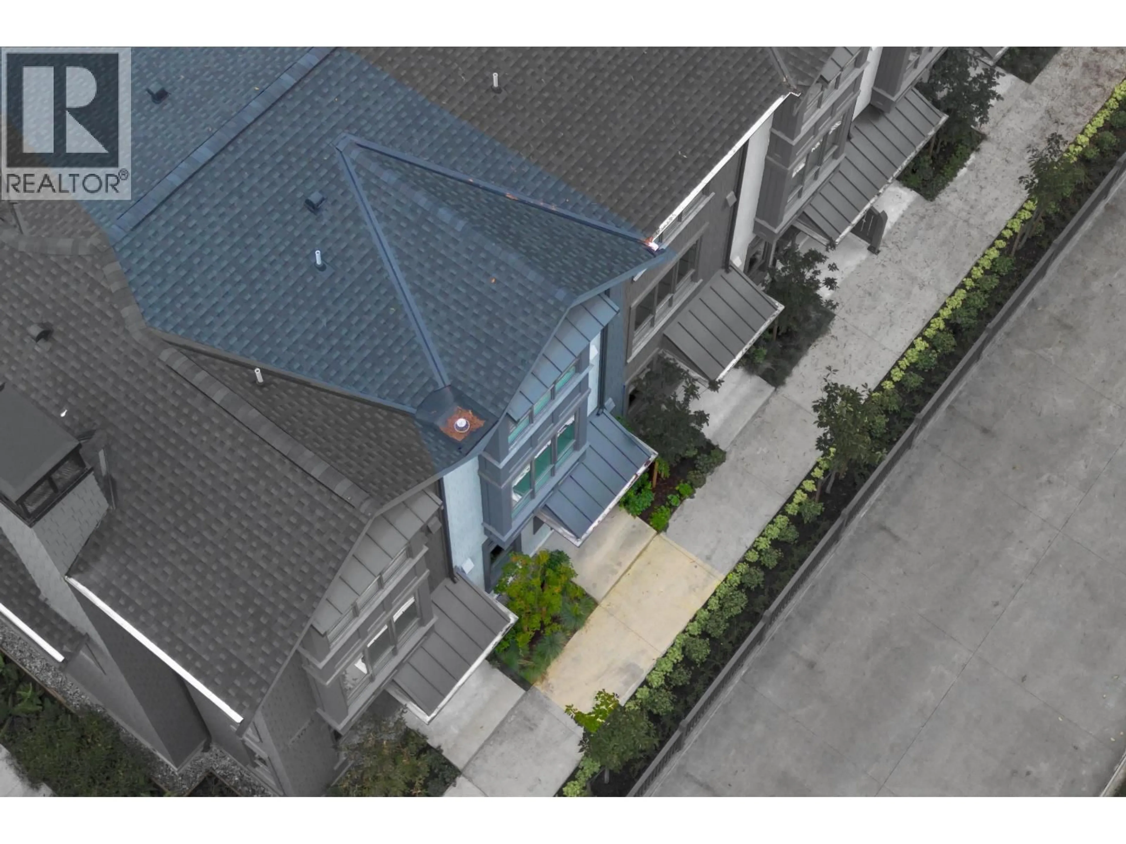 A pic from outside/outdoor area/front of a property/back of a property/a pic from drone, building for 105 - 2304 EMERY COURT, North Vancouver British Columbia V0V0V0