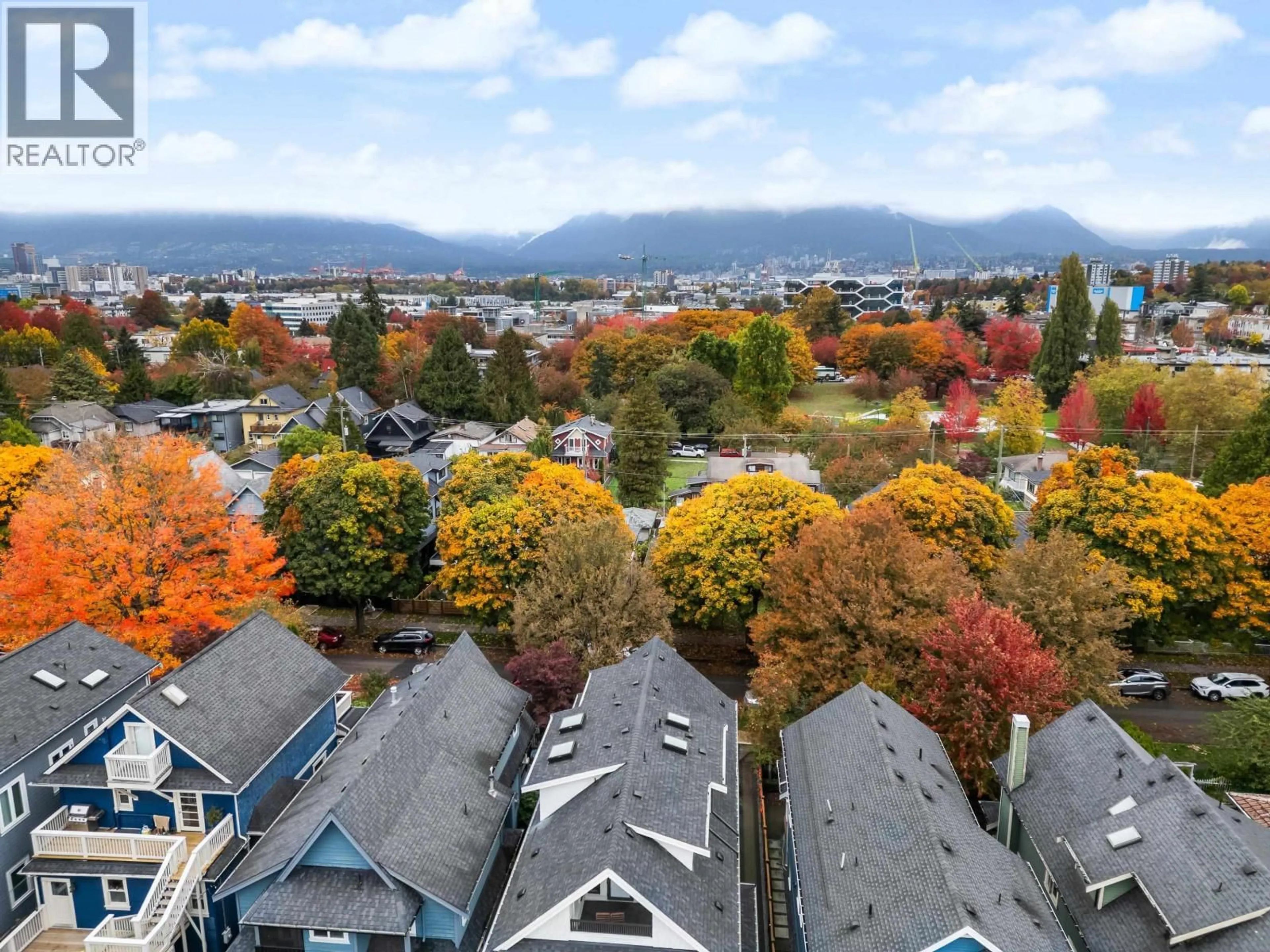 A pic from outside/outdoor area/front of a property/back of a property/a pic from drone, mountain view for 1 - 1166 11TH AVENUE, Vancouver British Columbia V5T2G3