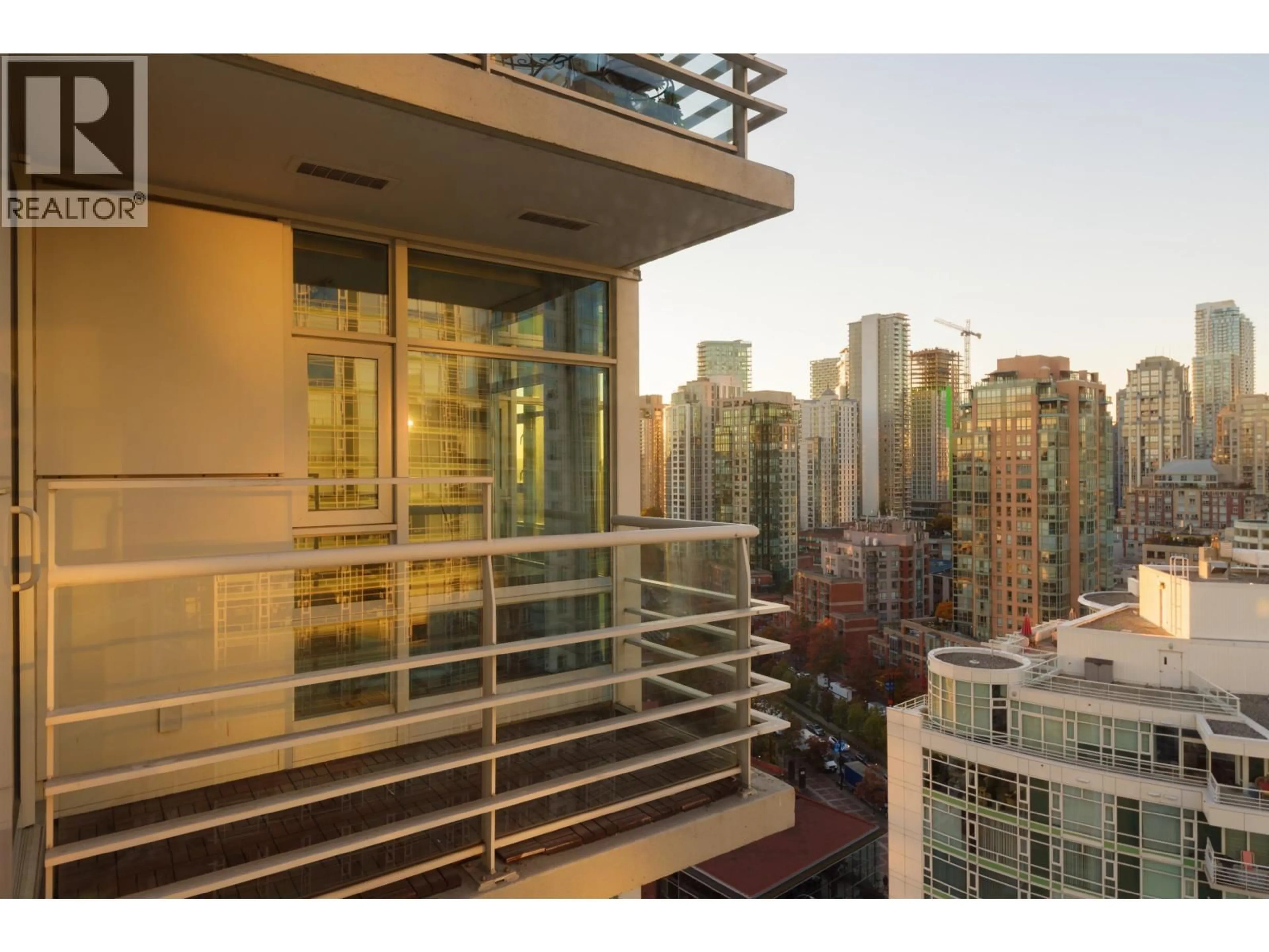Balcony in the apartment, city buildings view from balcony for 2305 - 1199 MARINASIDE CRESCENT, Vancouver British Columbia V6Z2Y2
