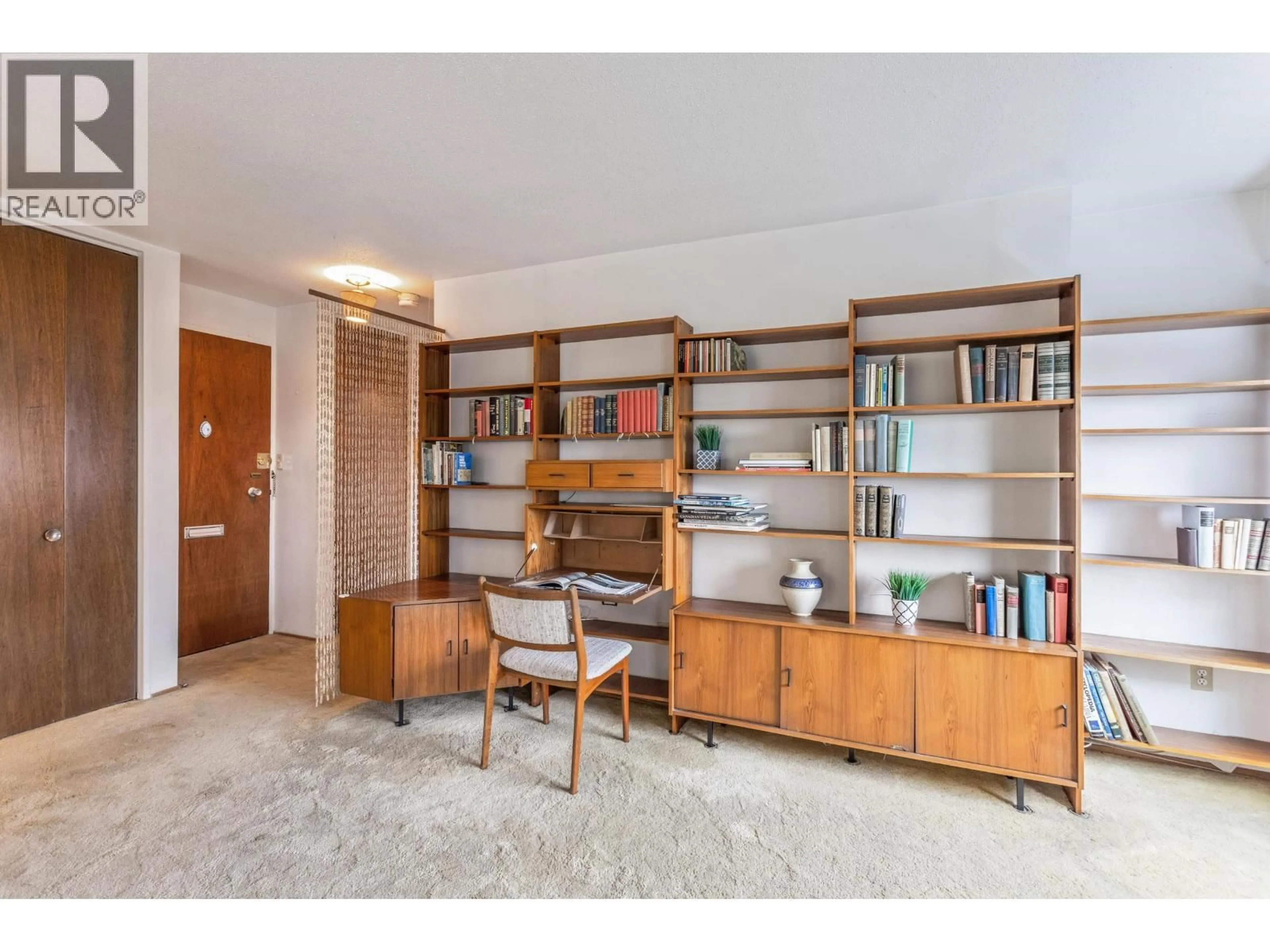 Living room with furniture, wood/laminate floor for 402 - 6026 TISDALL STREET, Vancouver British Columbia V5Z3N2