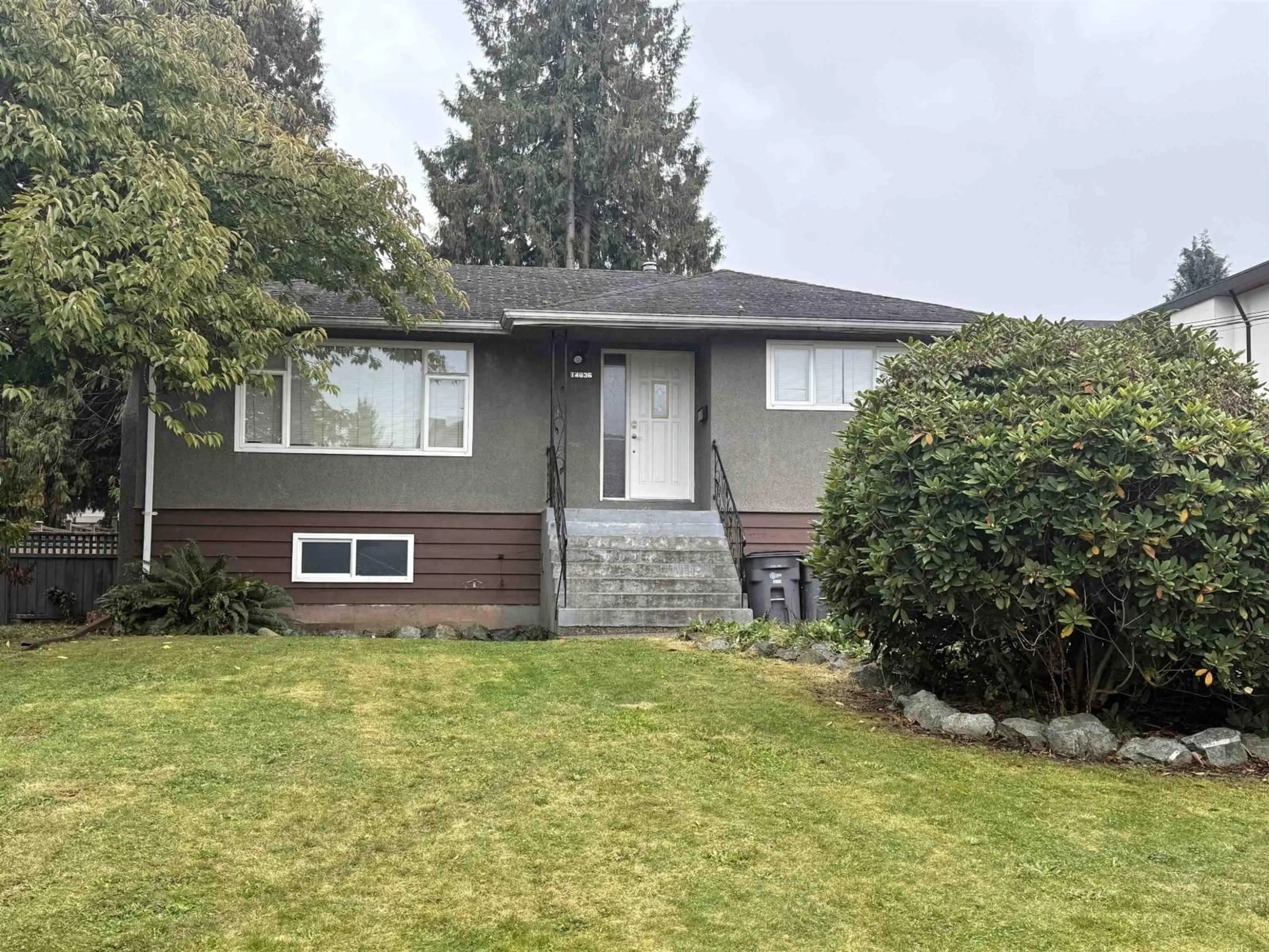 Home with vinyl exterior material, street for 14636 109A, Surrey British Columbia V3R1Y8