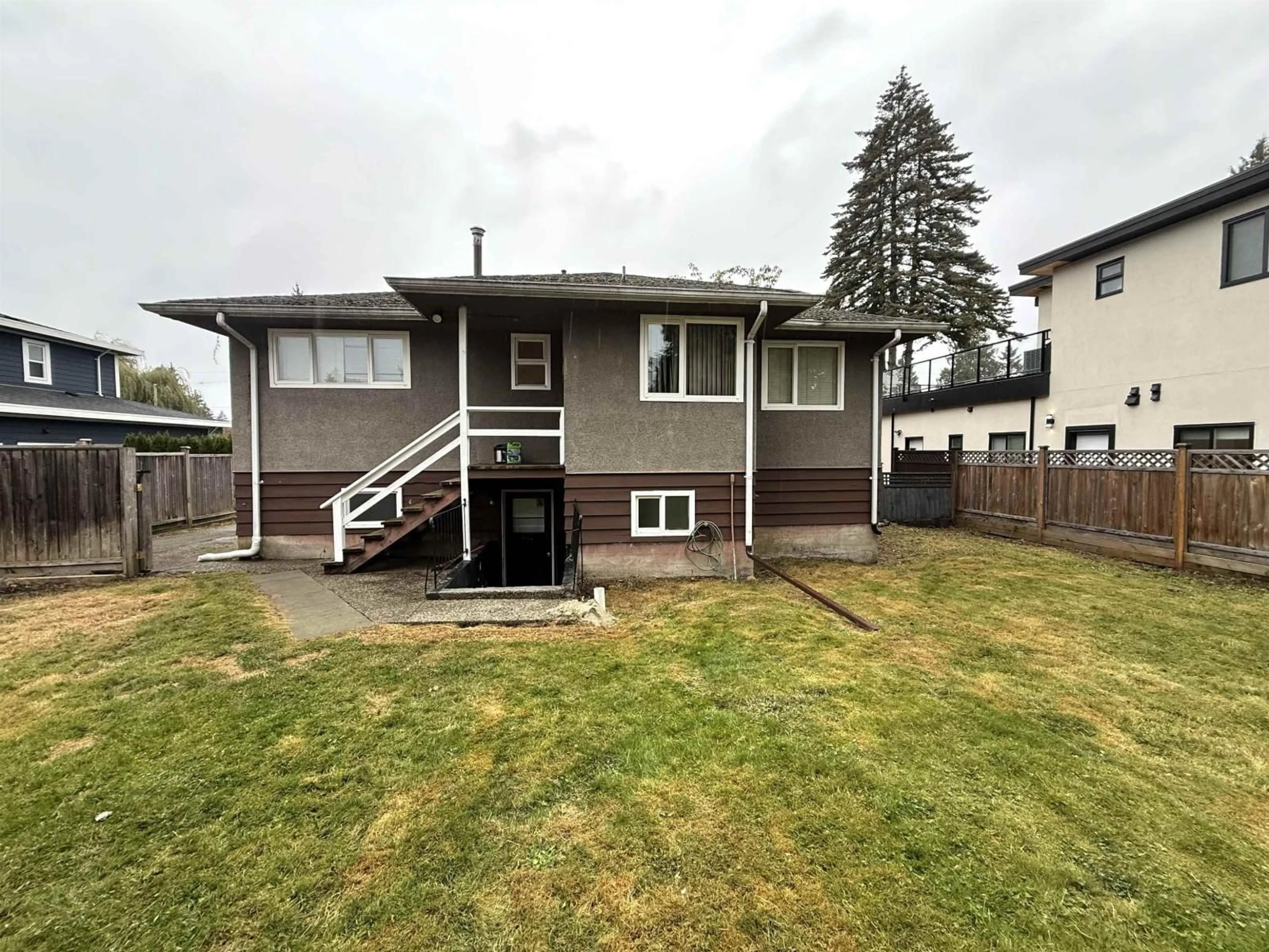 A pic from outside/outdoor area/front of a property/back of a property/a pic from drone, street for 14636 109A, Surrey British Columbia V3R1Y8