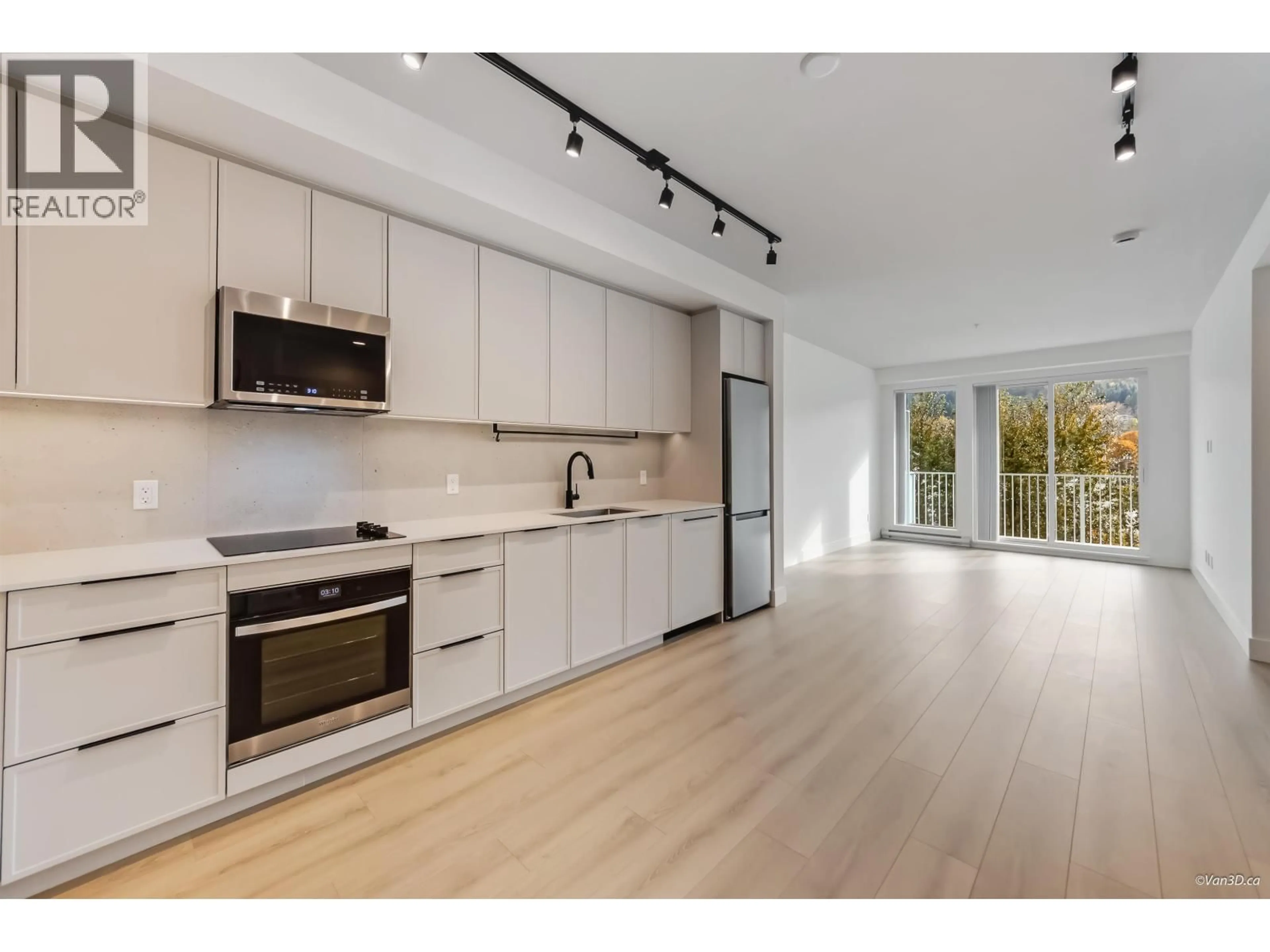 Open concept kitchen, wood/laminate floor for 408 - 3075 MURRAY STREET, Port Moody British Columbia V3H1X3