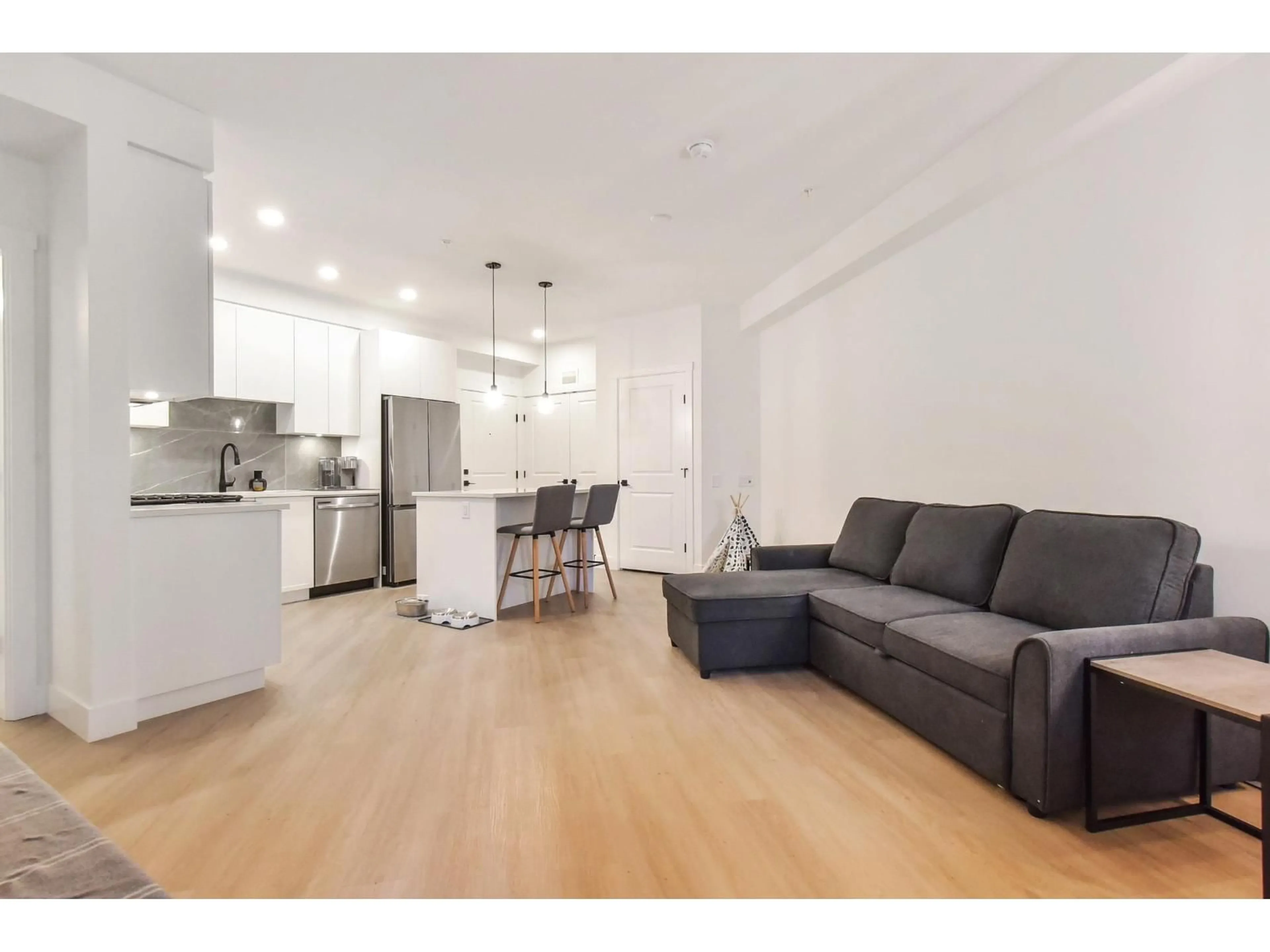 Open concept kitchen, unknown for 311 - 3438 146A, Surrey British Columbia V4P0J1