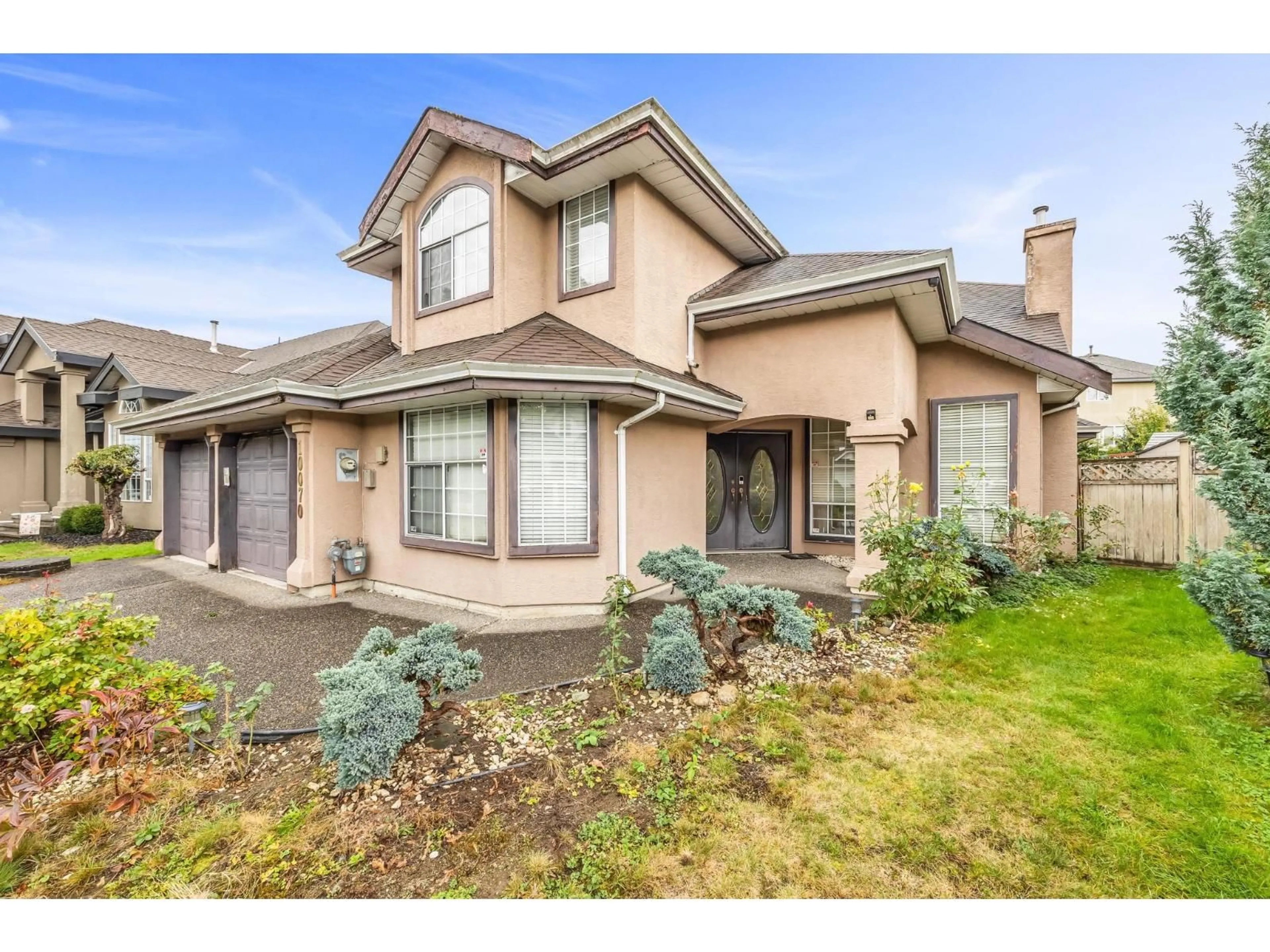 Home with vinyl exterior material, street for 10070 171A, Surrey British Columbia V4N3L3