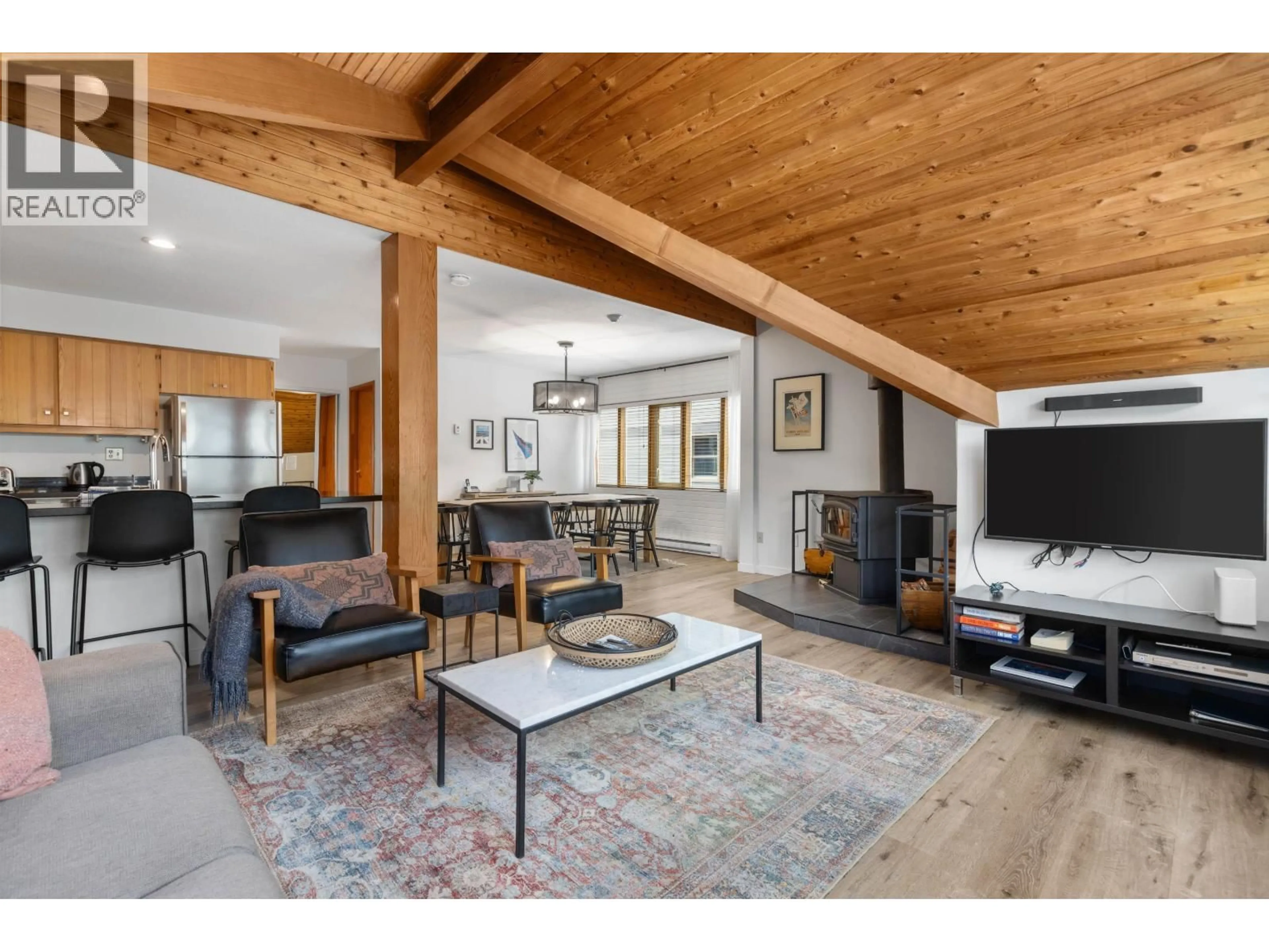 Living room with furniture, wood/laminate floor for A - 4324 SUNRISE ALLEY, Whistler British Columbia V0N1B0