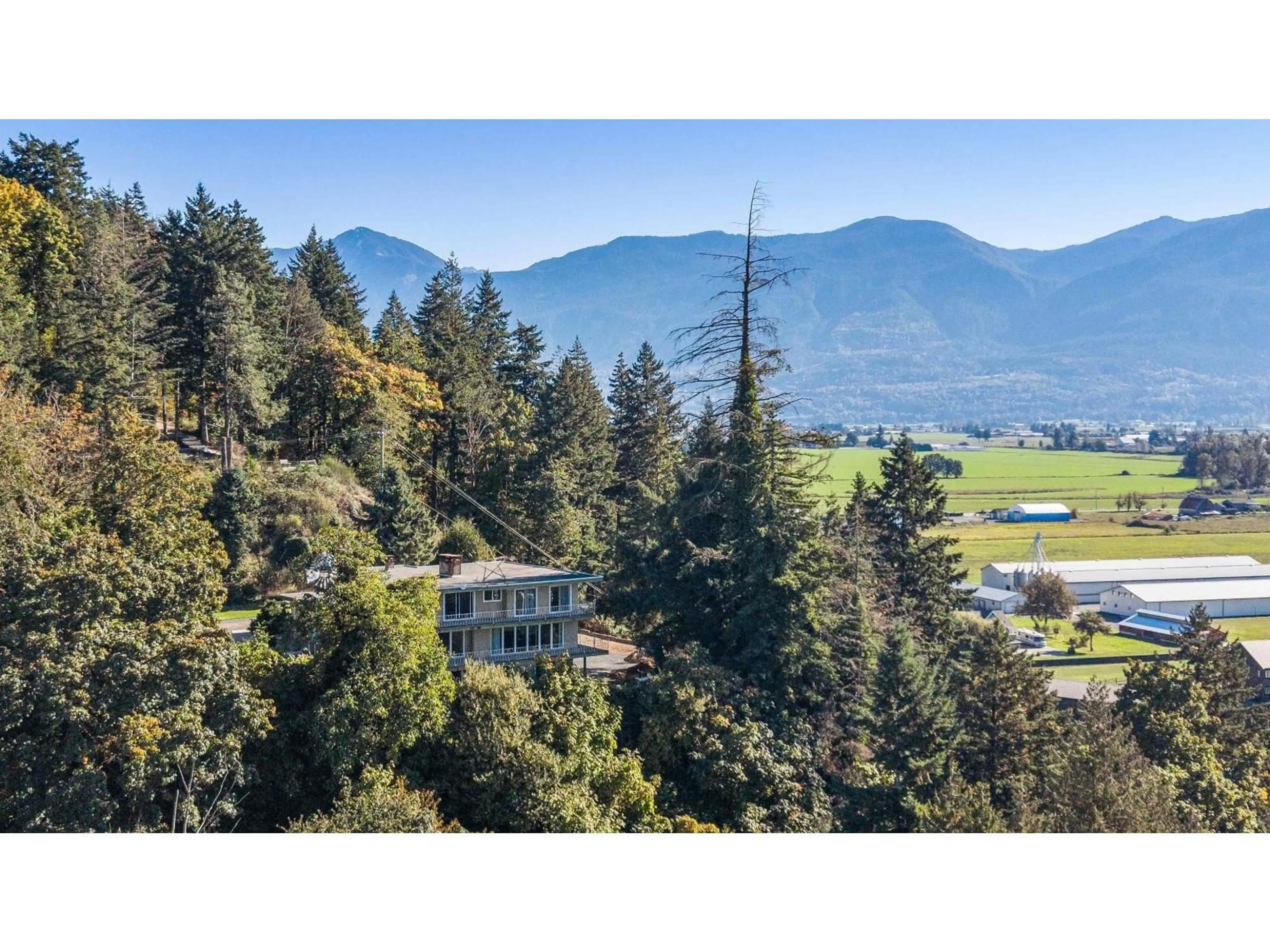 A pic from outside/outdoor area/front of a property/back of a property/a pic from drone, mountain view for 9890 QUARRY ROAD, Chilliwack British Columbia V2P3M2