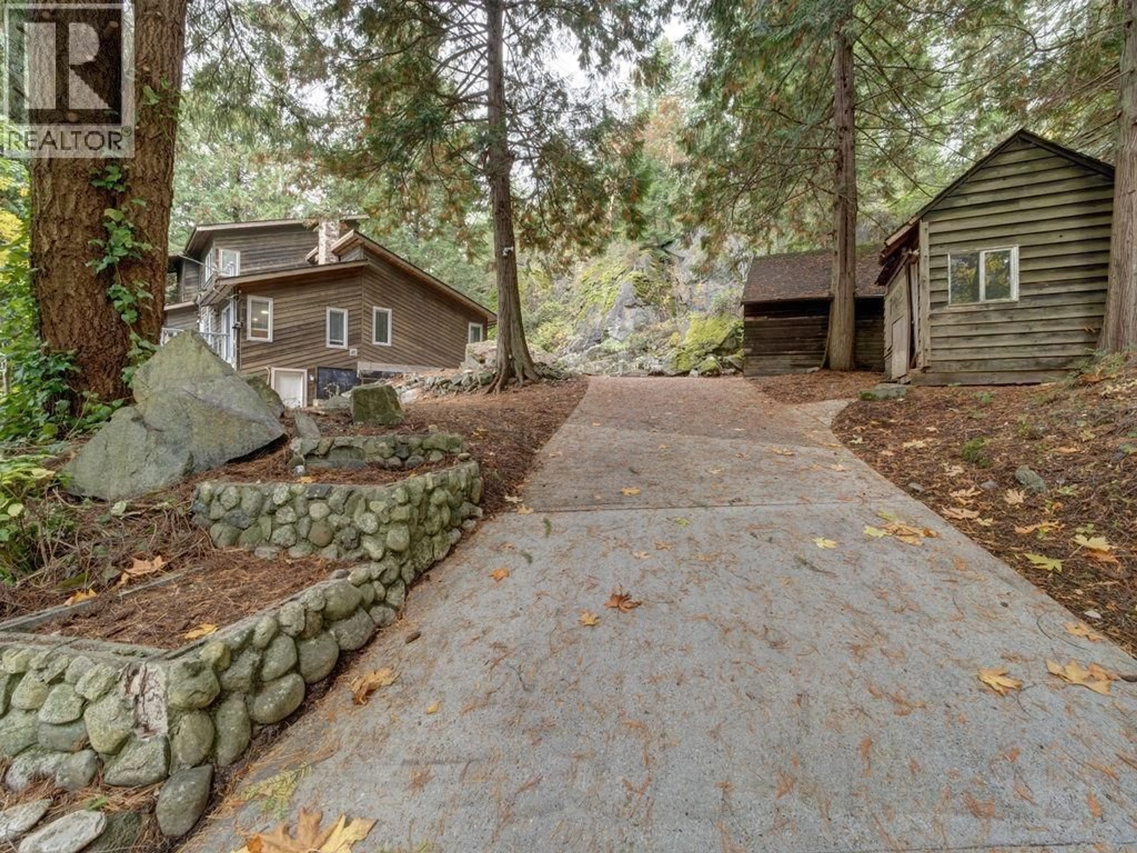 A pic from outside/outdoor area/front of a property/back of a property/a pic from drone, forest/trees view for 7462 REDROOFFS ROAD, Halfmoon Bay British Columbia V7Z1C3