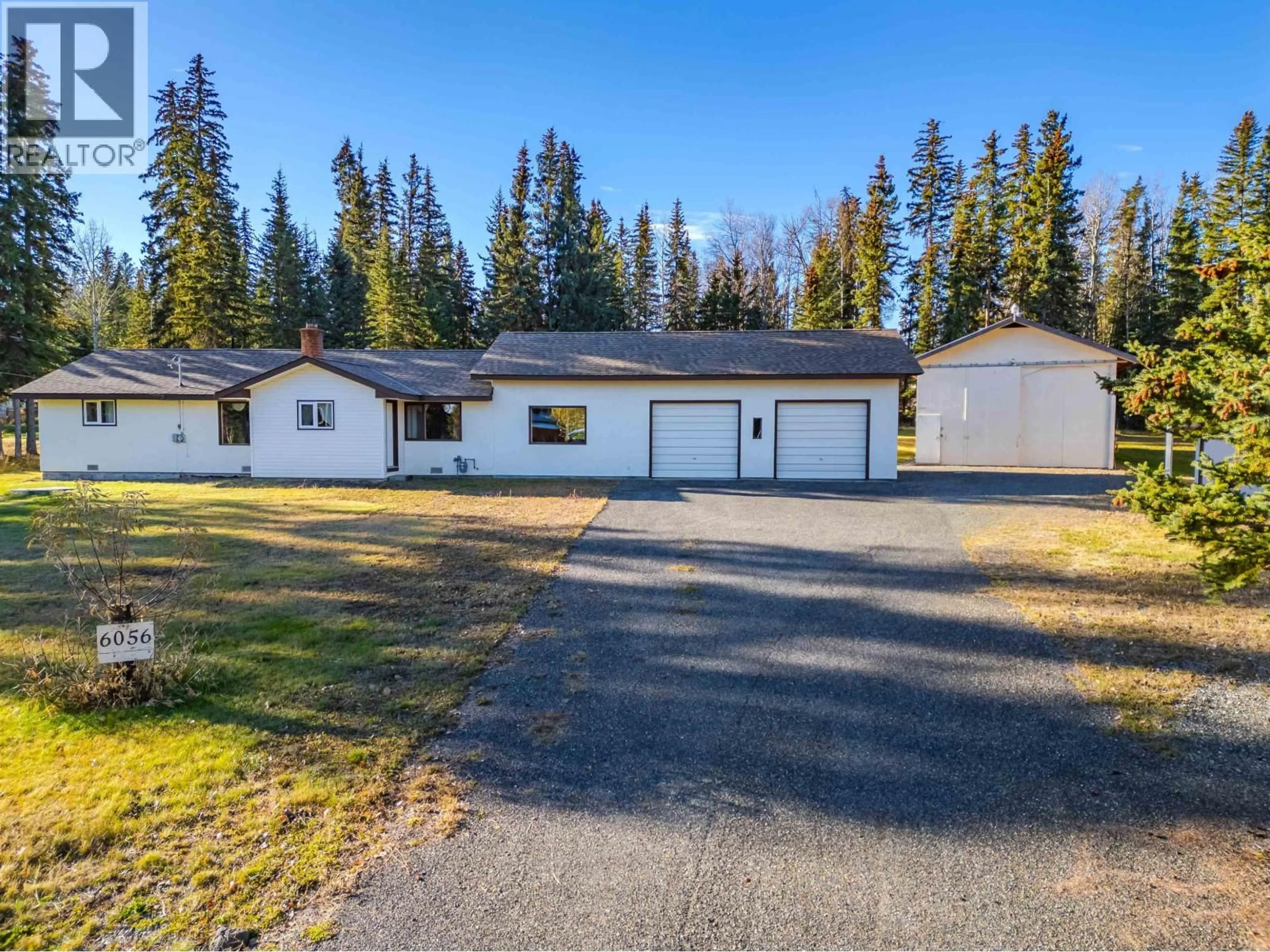 A pic from outside/outdoor area/front of a property/back of a property/a pic from drone, street for 6056 NORMAN ROAD, Horse Lake British Columbia V0K2E3
