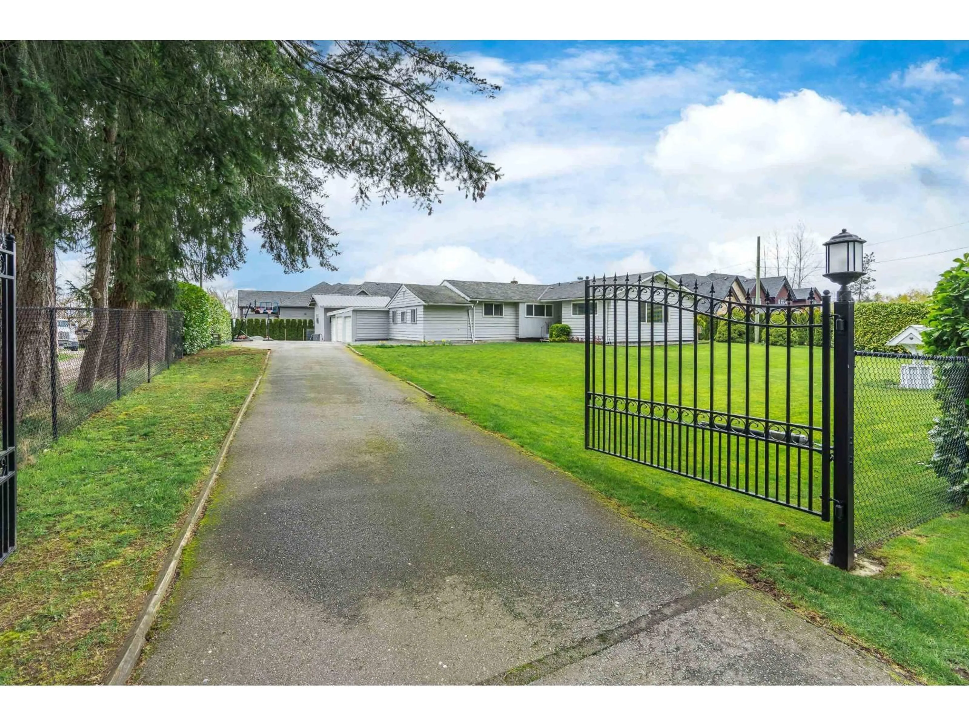 A pic from outside/outdoor area/front of a property/back of a property/a pic from drone, street for 1361 200, Langley British Columbia V2Z1W5