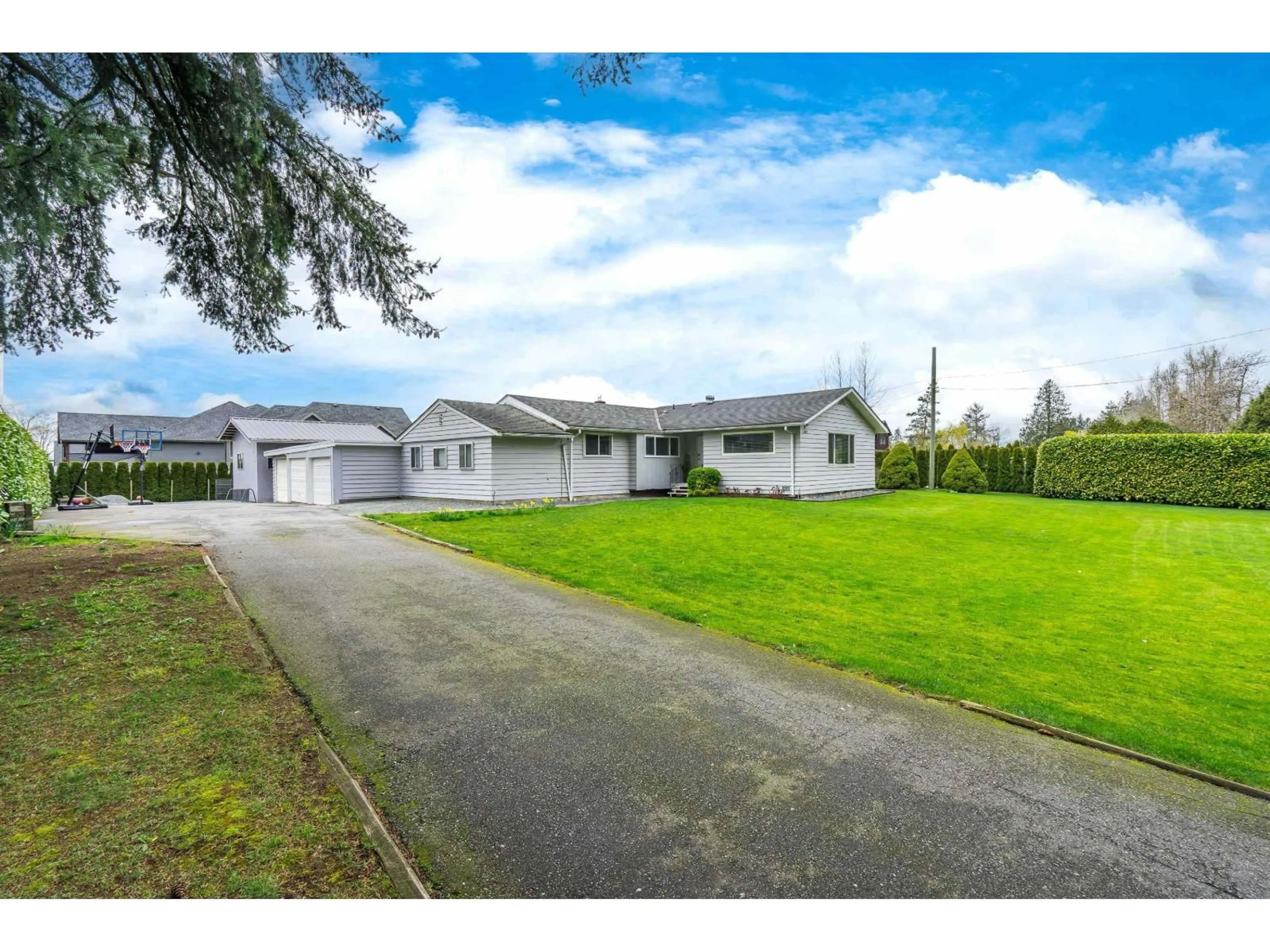 A pic from outside/outdoor area/front of a property/back of a property/a pic from drone, street for 1361 200, Langley British Columbia V2Z1W5