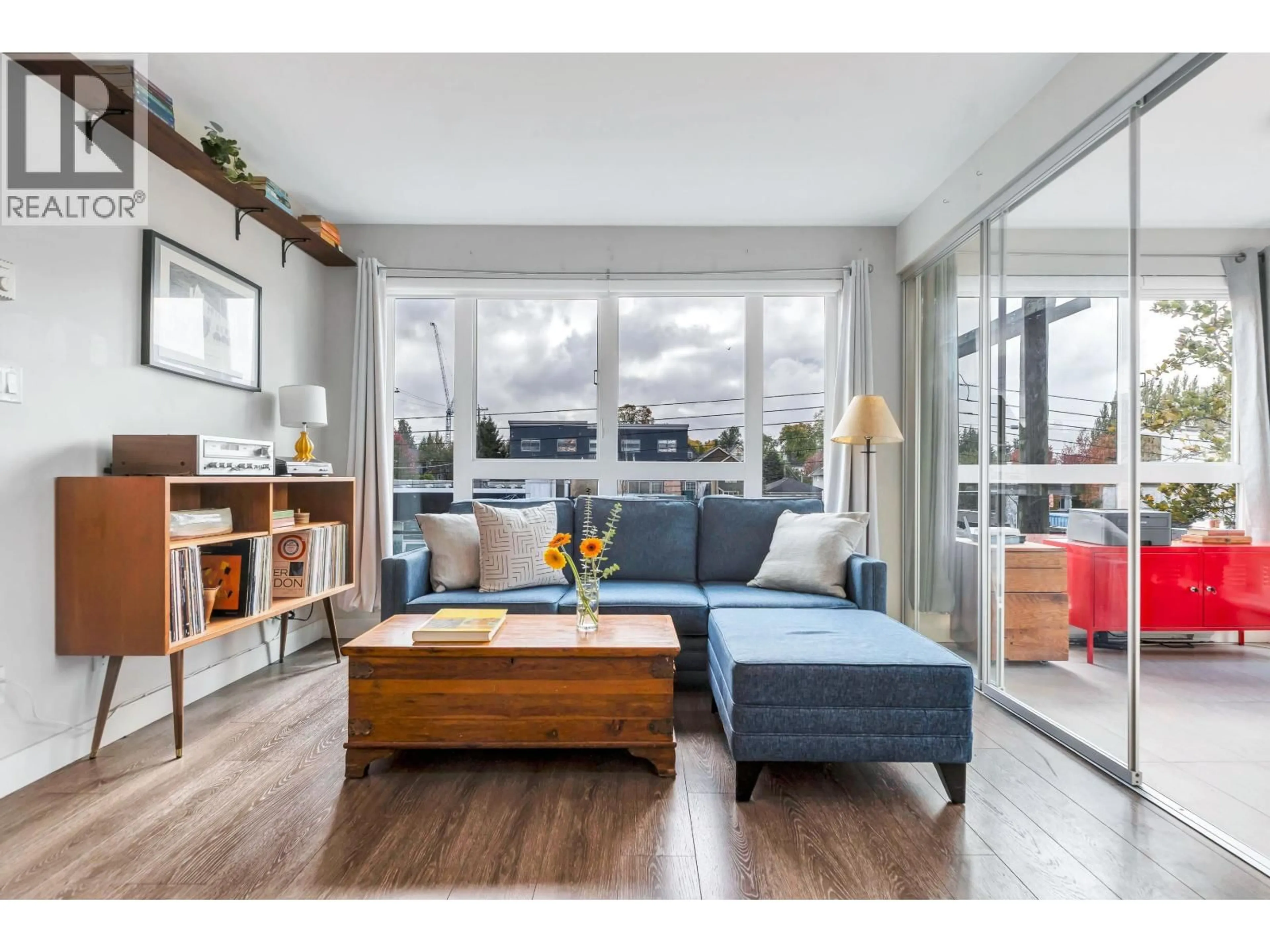 Living room with furniture, wood/laminate floor for 329 - 1588 HASTINGS STREET, Vancouver British Columbia V5L0B8