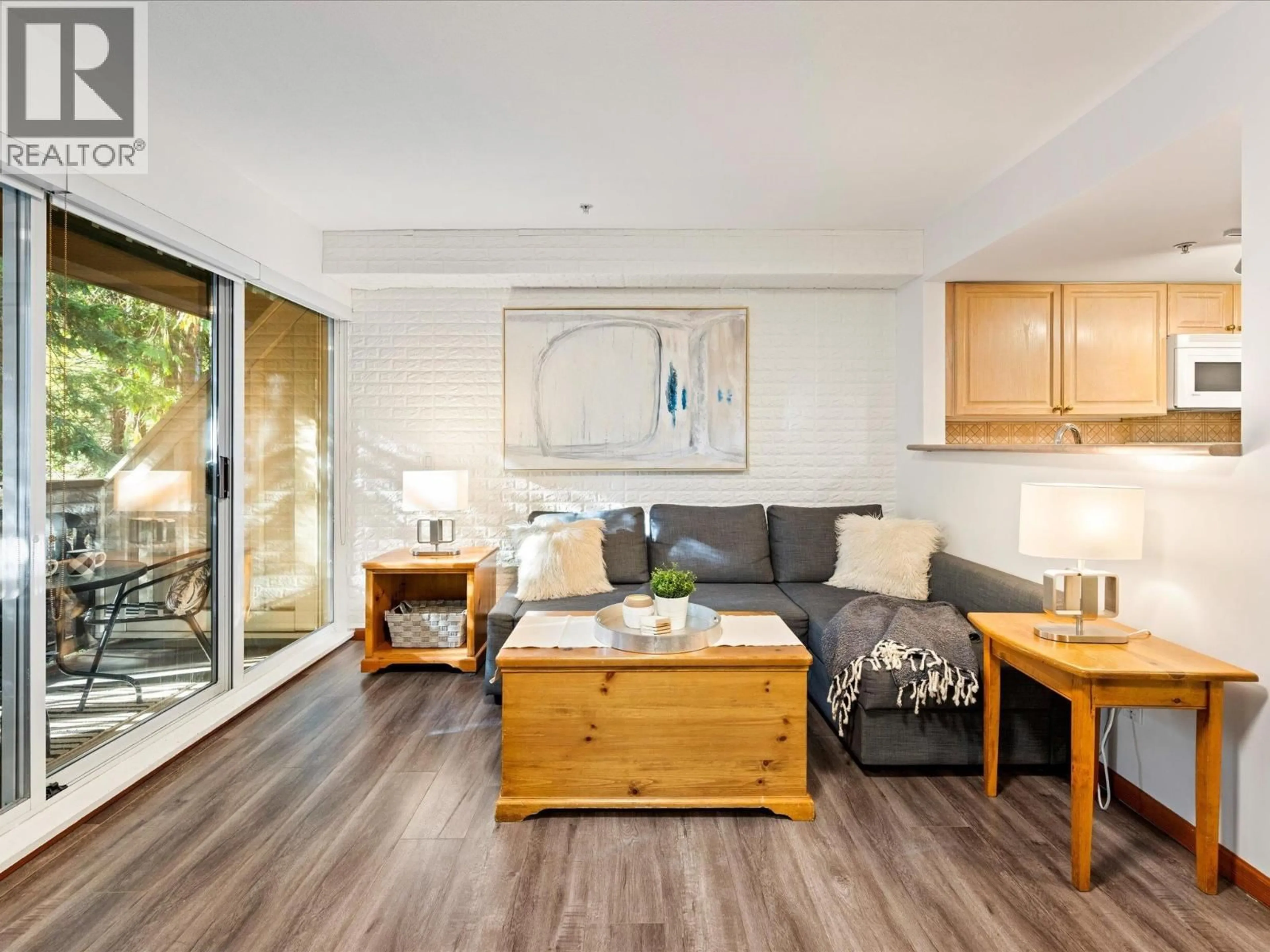 Living room with furniture, wood/laminate floor for 2 - 4335 NORTHLANDS BOULEVARD, Whistler British Columbia V0N1B4