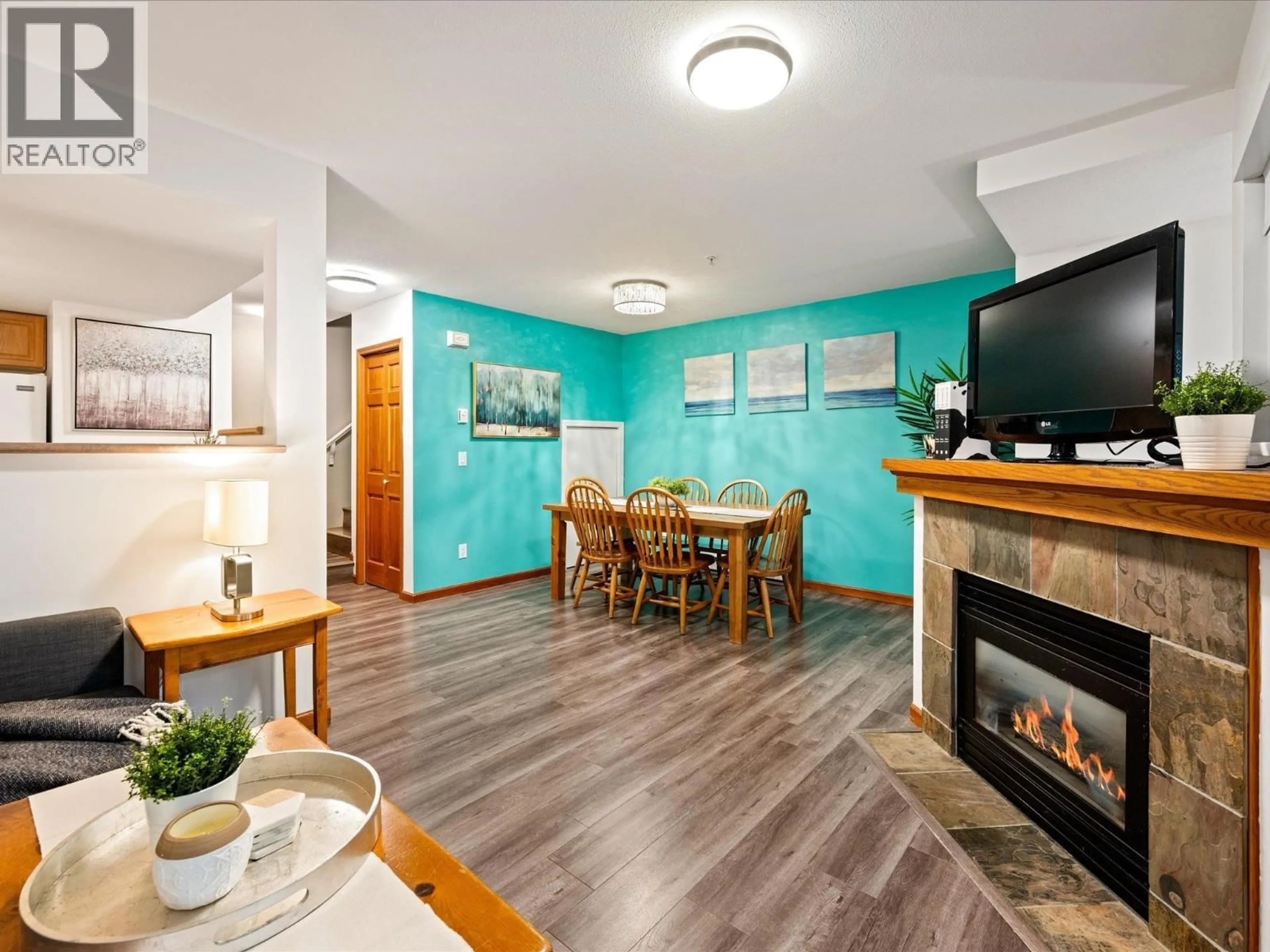 Open concept kitchen, wood/laminate floor for 2 - 4335 NORTHLANDS BOULEVARD, Whistler British Columbia V0N1B4