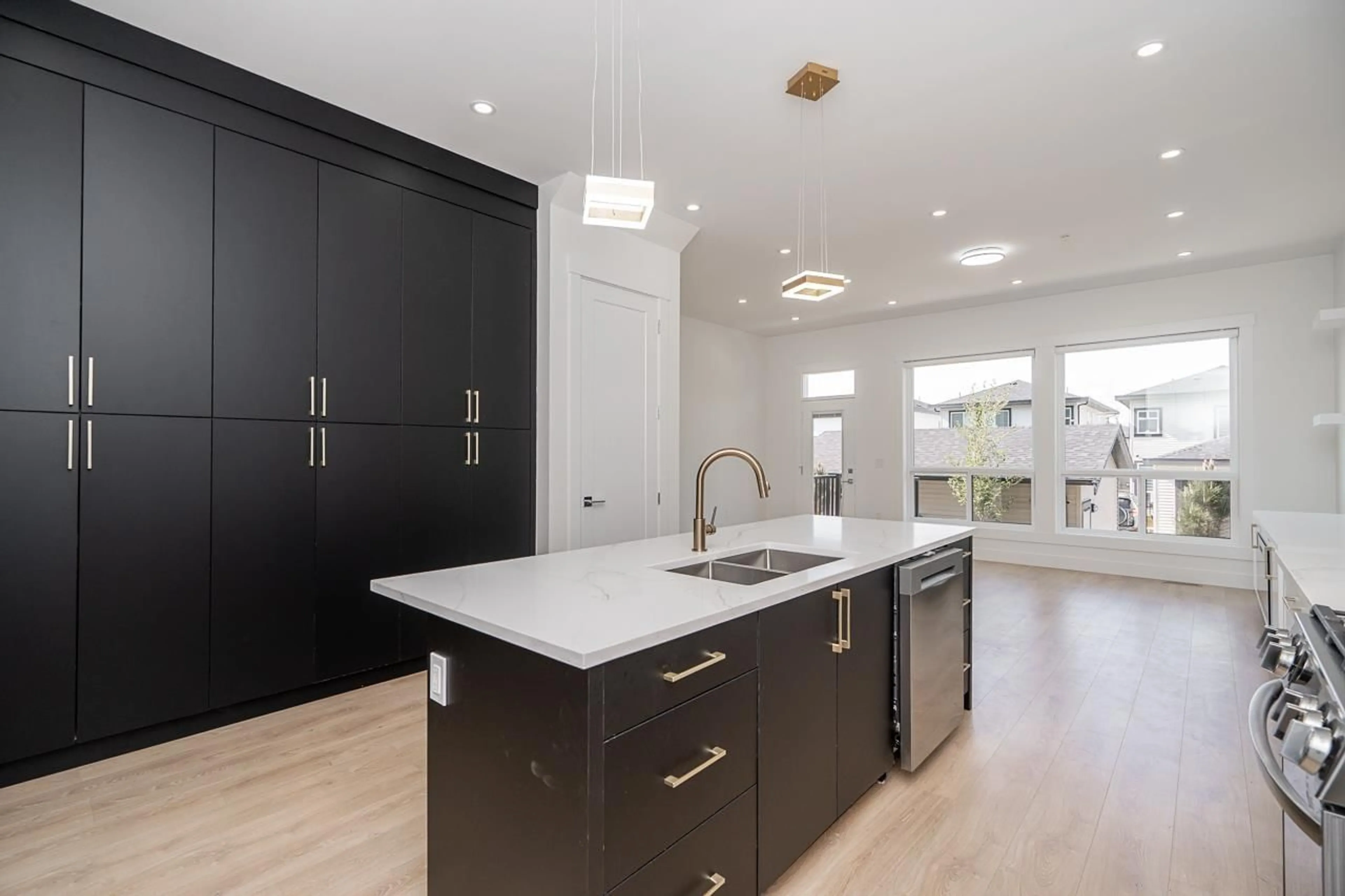 Open concept kitchen, wood/laminate floor for 20535 74B, Langley British Columbia V2Y3S8