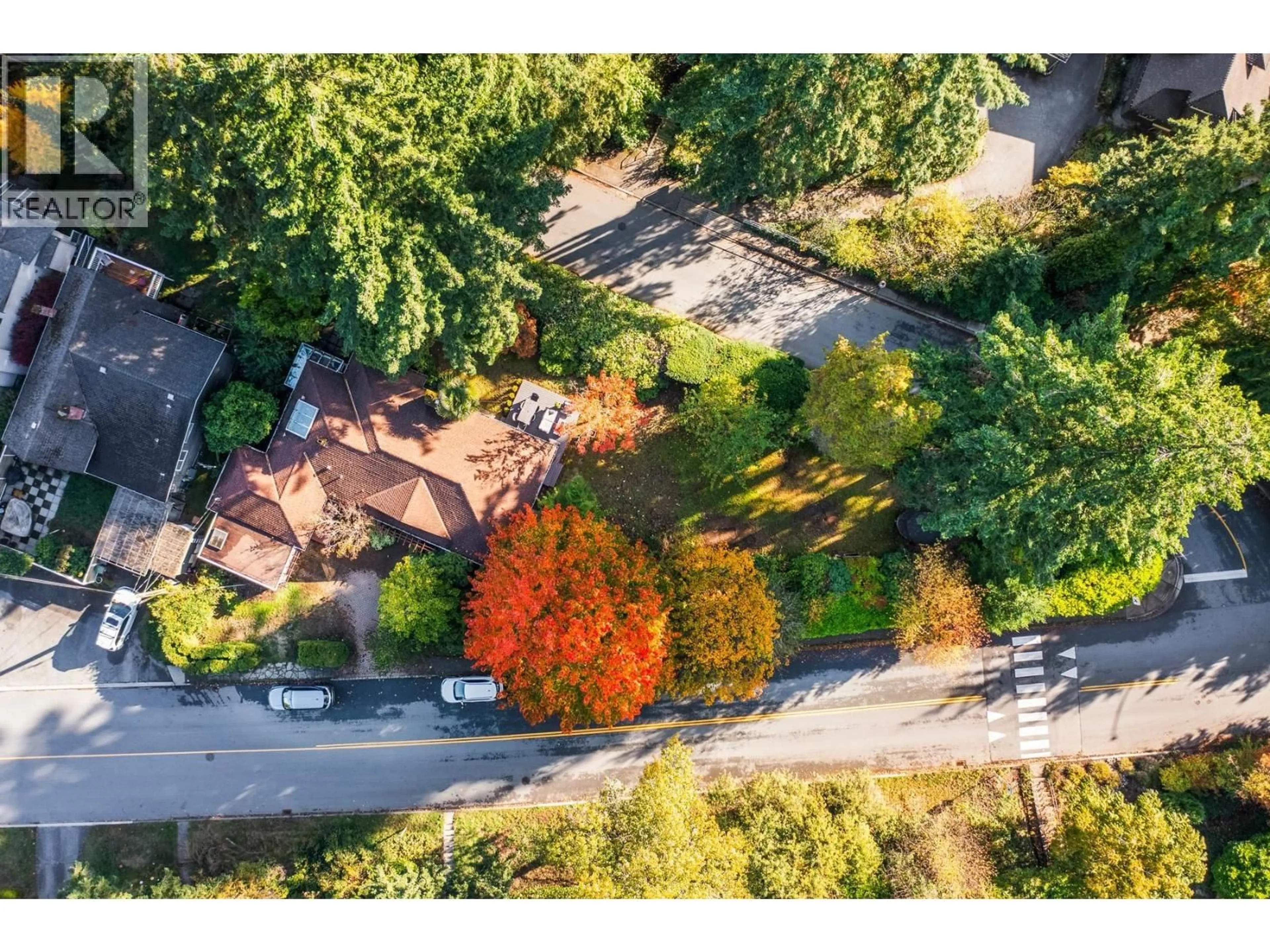 A pic from outside/outdoor area/front of a property/back of a property/a pic from drone, street for 1090 KEITH ROAD, North Vancouver British Columbia V7P1Y5
