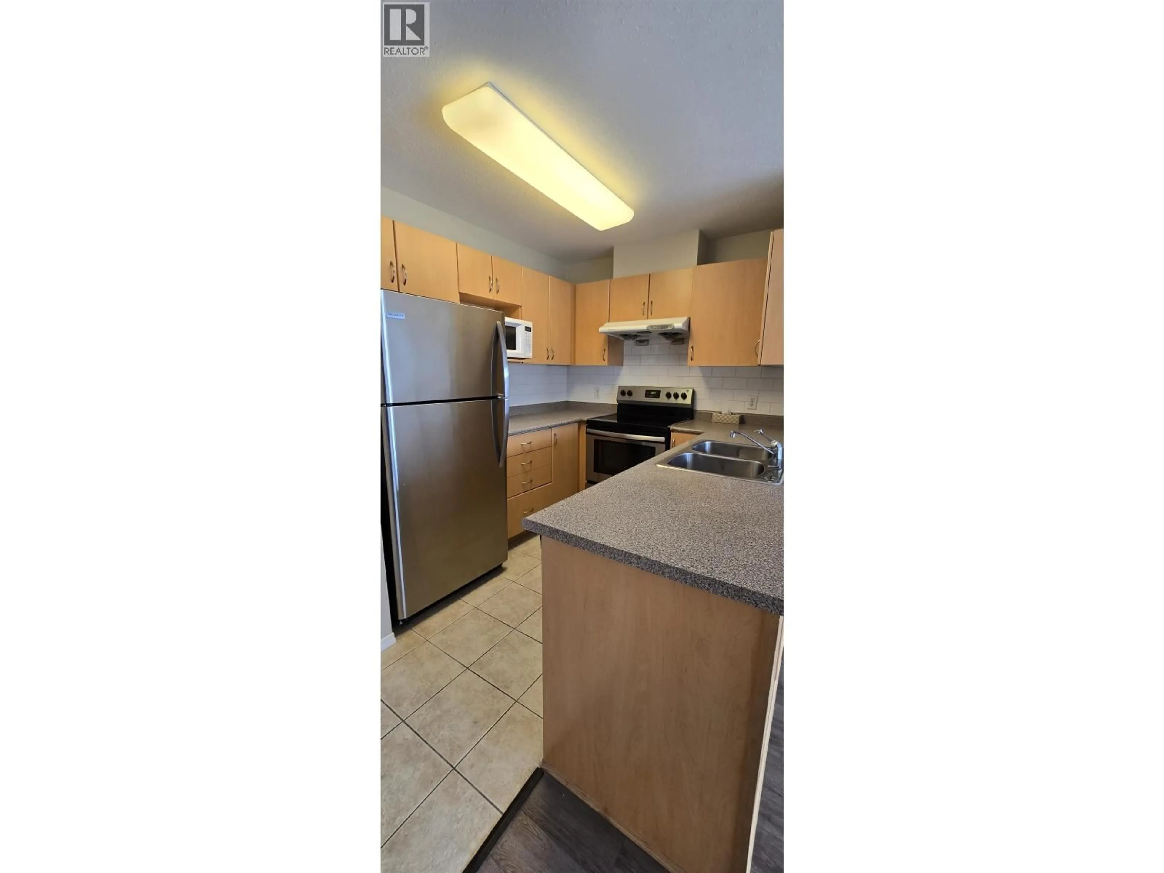 Standard kitchen, unknown for PH3 - 5438 RUPERT STREET, Vancouver British Columbia V5R2K3