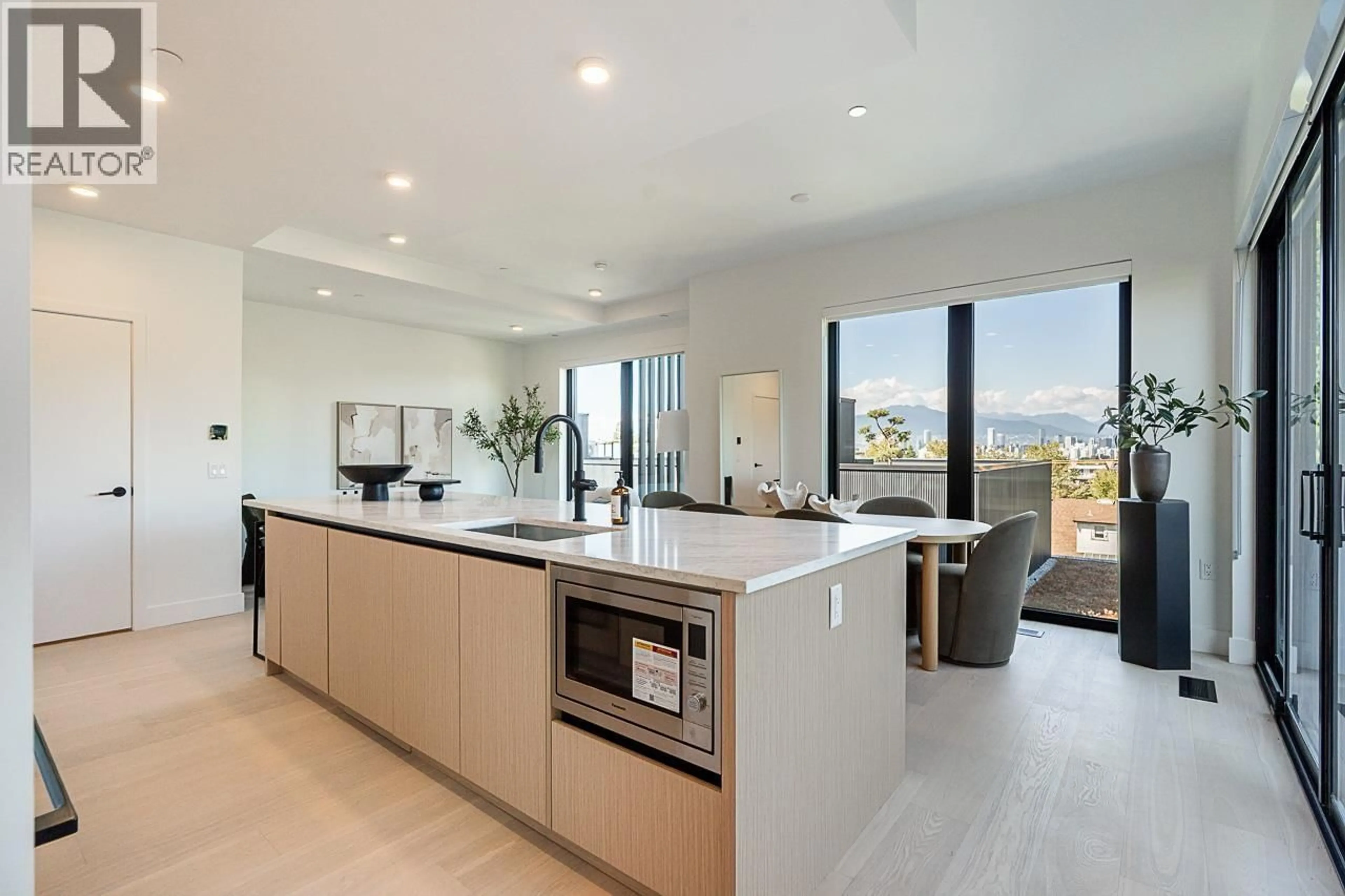 Open concept kitchen, unknown for 202 - 539 28TH AVENUE, Vancouver British Columbia V5Z2H2