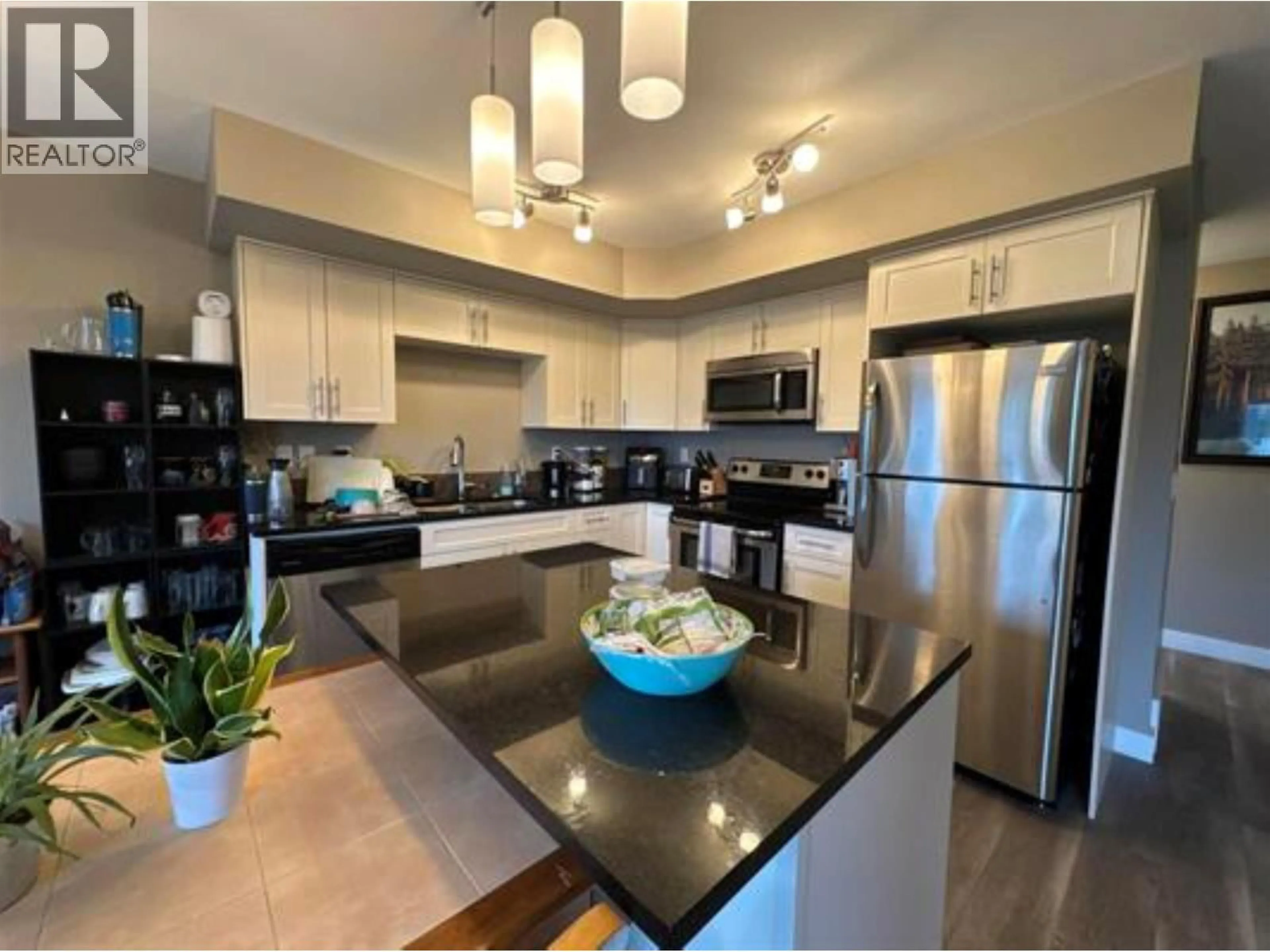Open concept kitchen, unknown for 119 - 10104 114A AVENUE, Fort St. John British Columbia V1J0K5