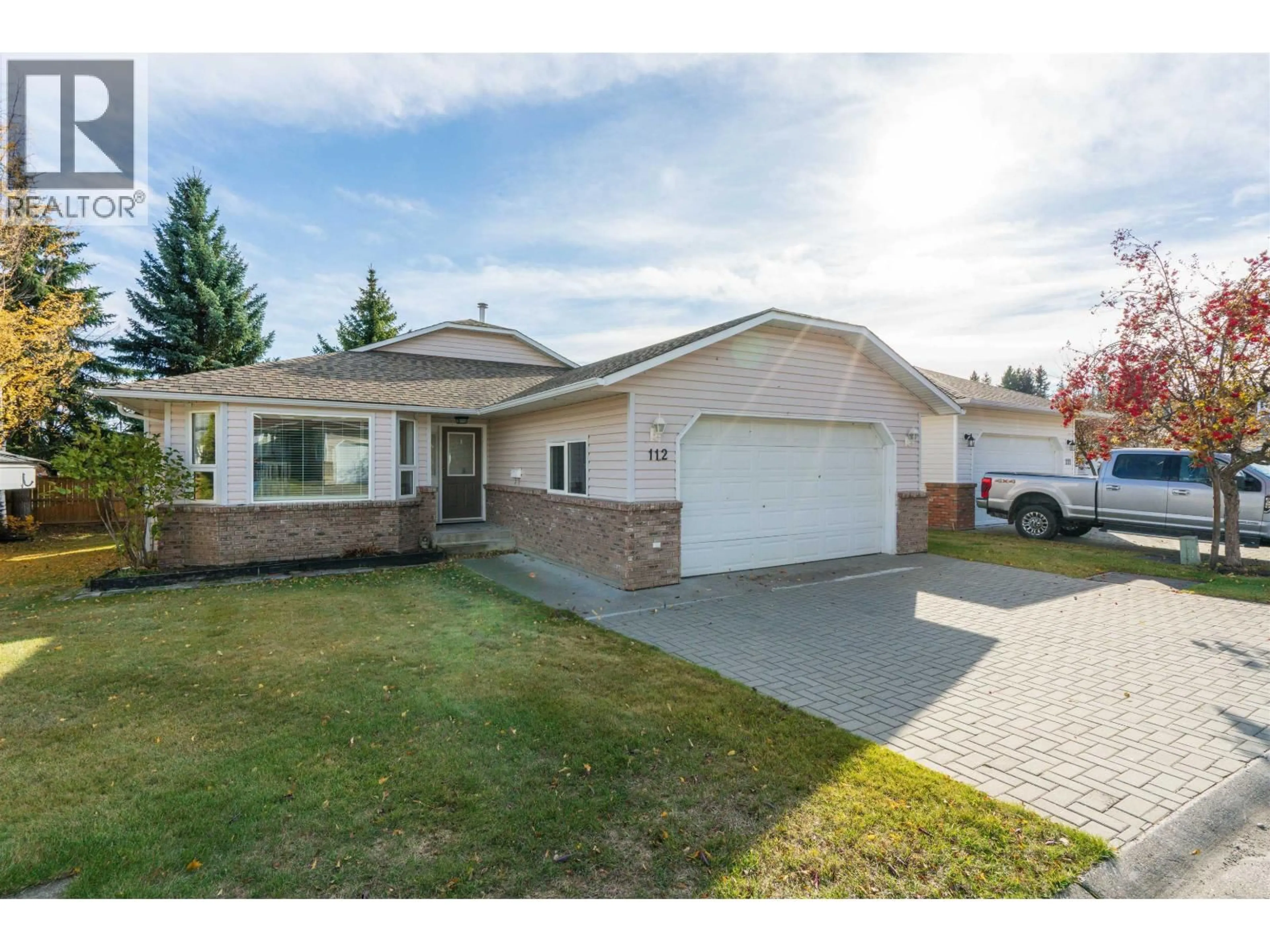 Home with vinyl exterior material, street for 112 - 7187 SOUTHRIDGE AVENUE, Prince George British Columbia V2N4Z3